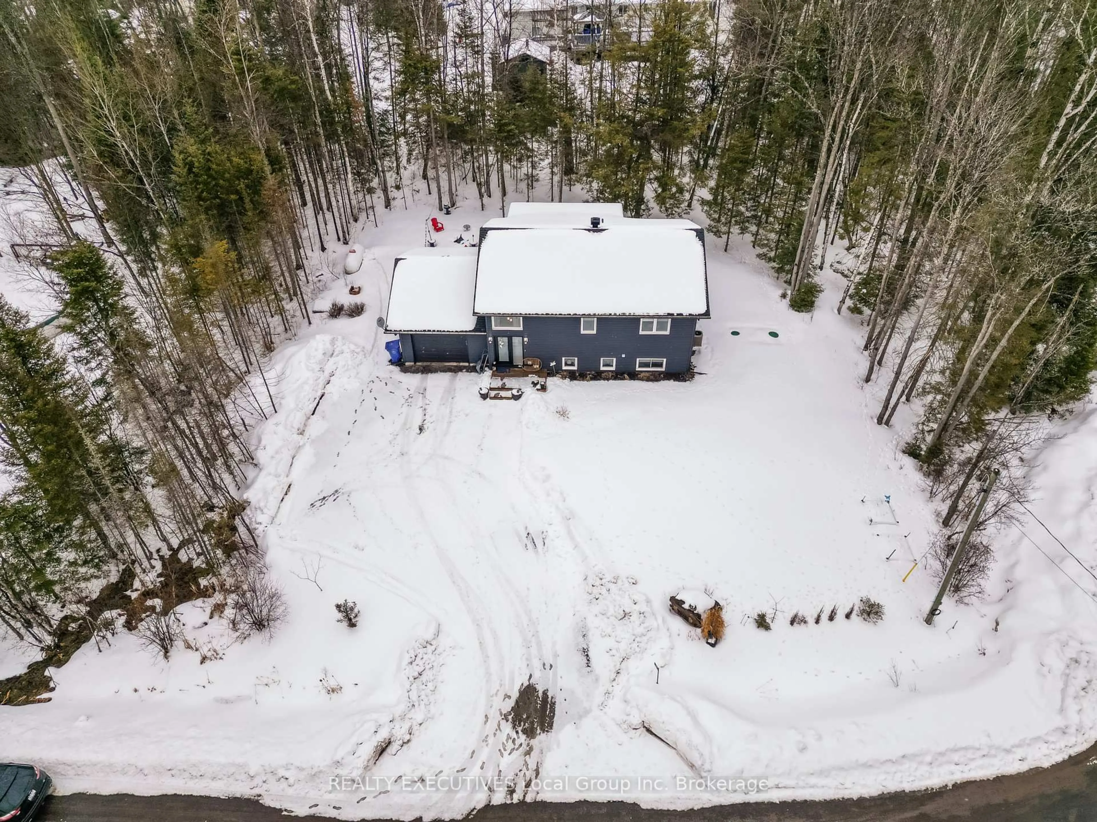 A pic from outside/outdoor area/front of a property/back of a property/a pic from drone, water/lake/river/ocean view for 61 Astor St, East Ferris Ontario P0H 1B0