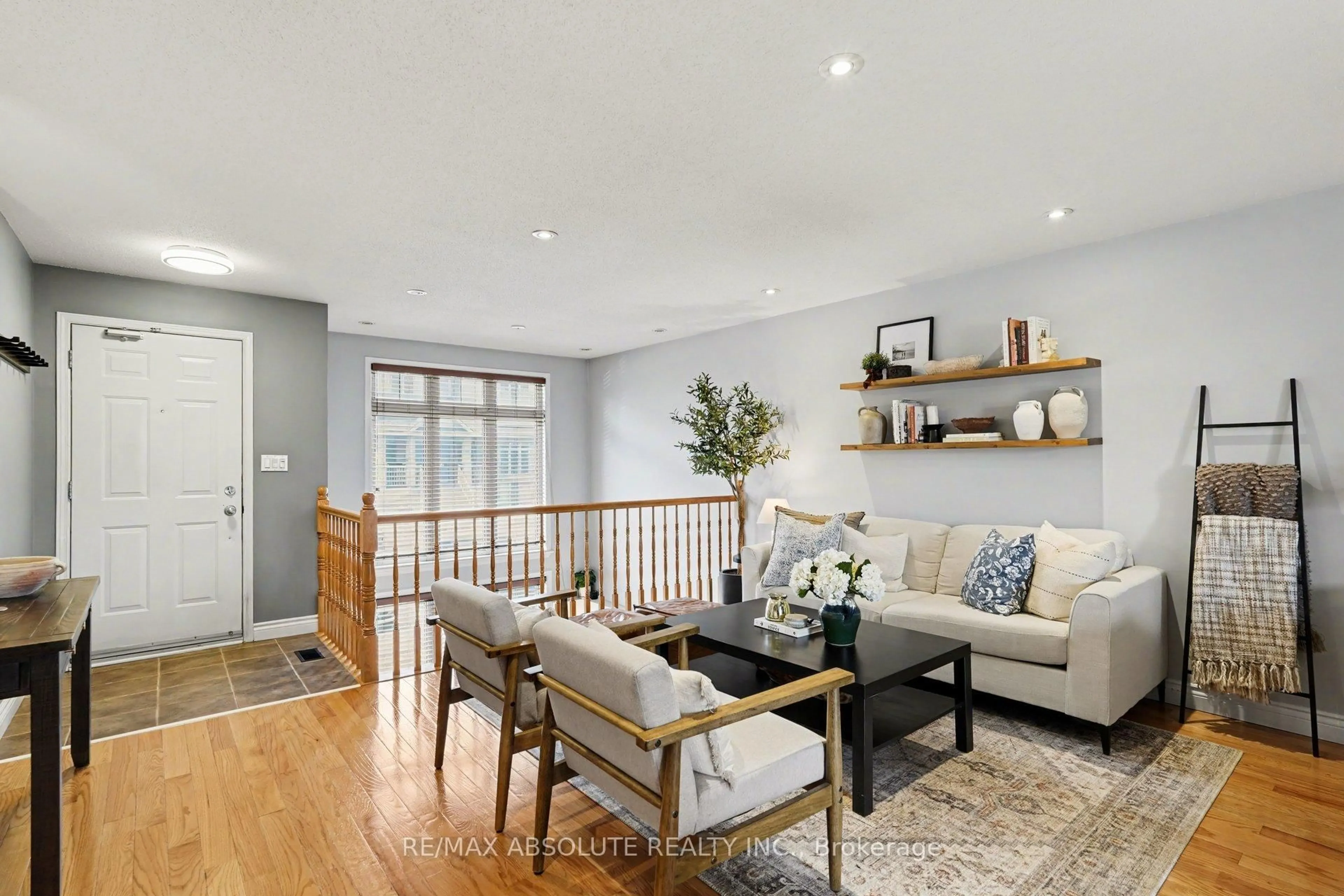 Living room with furniture, wood/laminate floor for 1512 Walkley Rd #108, Ottawa Ontario K1V 2G7