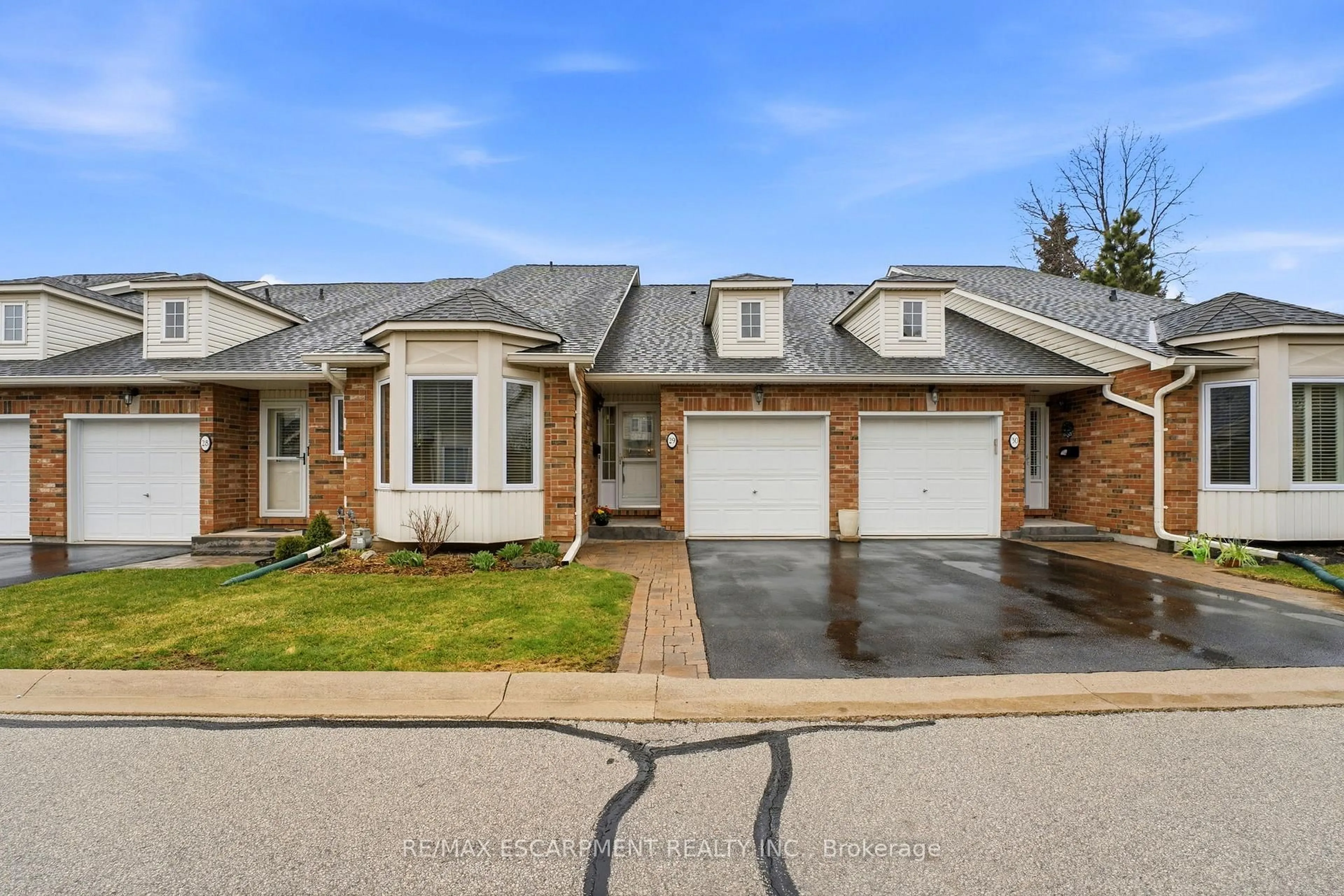 Home with brick exterior material, street for 222 Fellowes Cres #29, Hamilton Ontario L8B 0R1