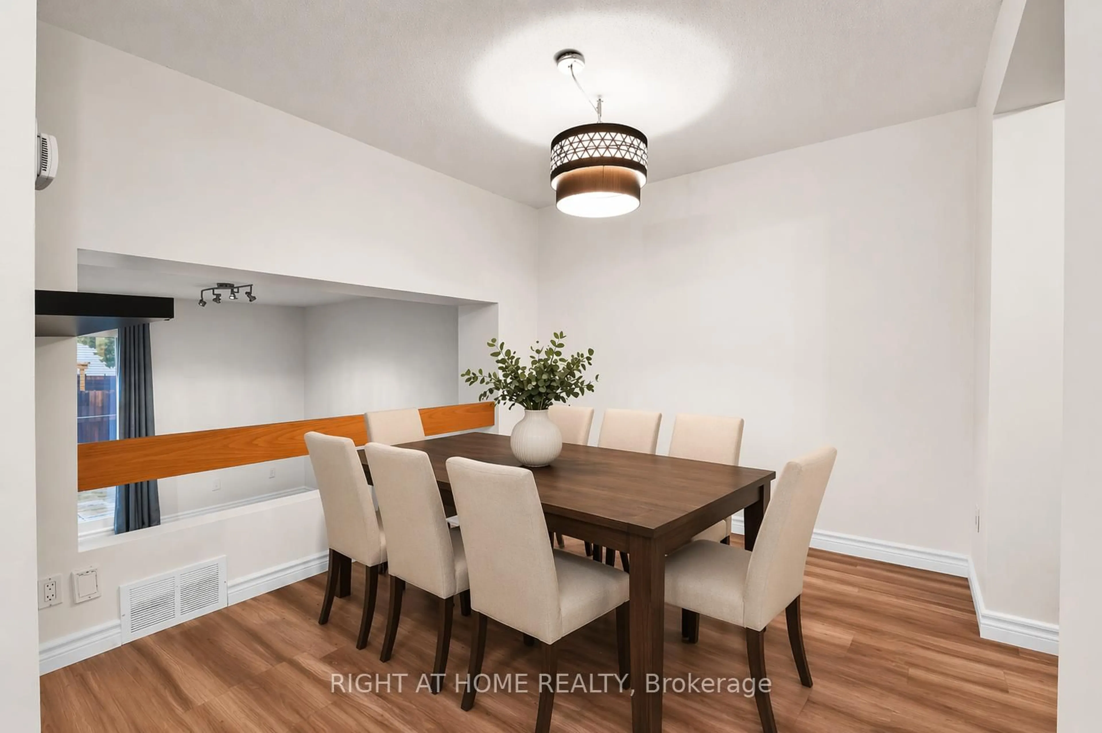 Dining room, wood/laminate floor for 1700 Lamoureux Dr #E, Orleans Ontario K1E 2N2