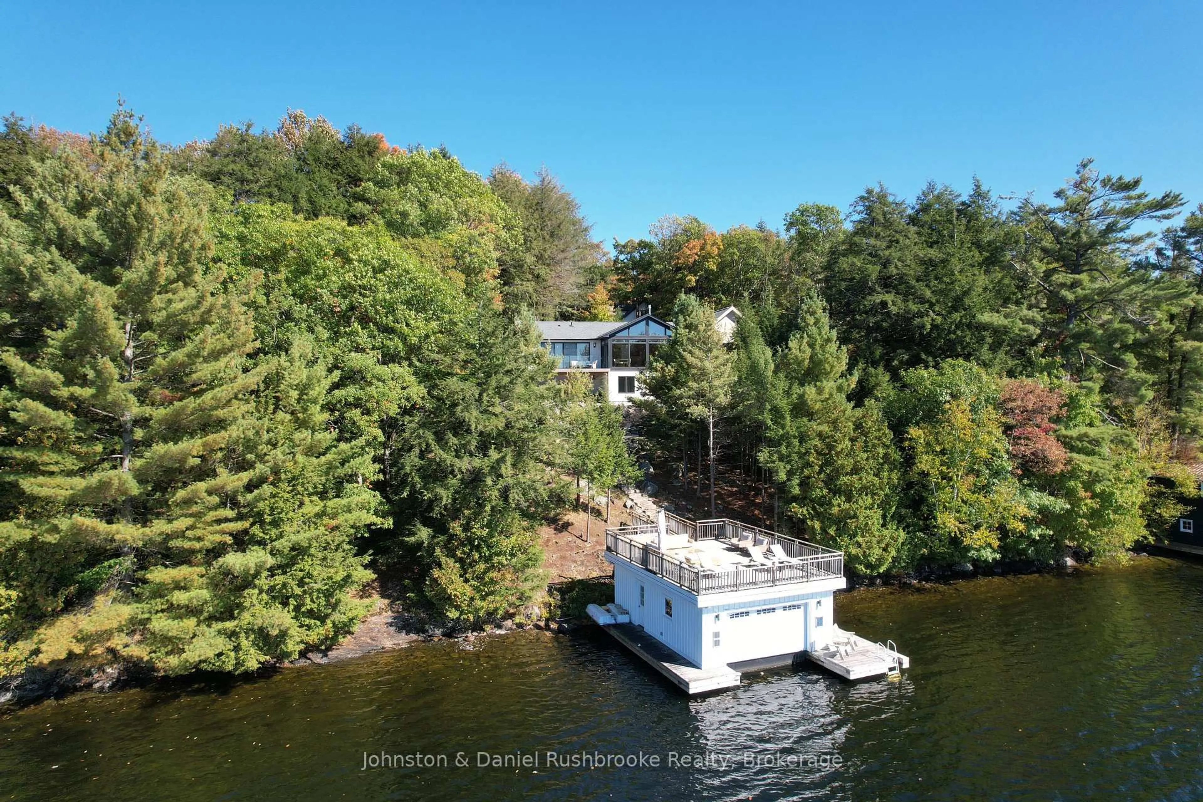 A pic from outside/outdoor area/front of a property/back of a property/a pic from drone, water/lake/river/ocean view for 1302 Acton Island Rd, Muskoka Lakes Ontario P0C 1A0