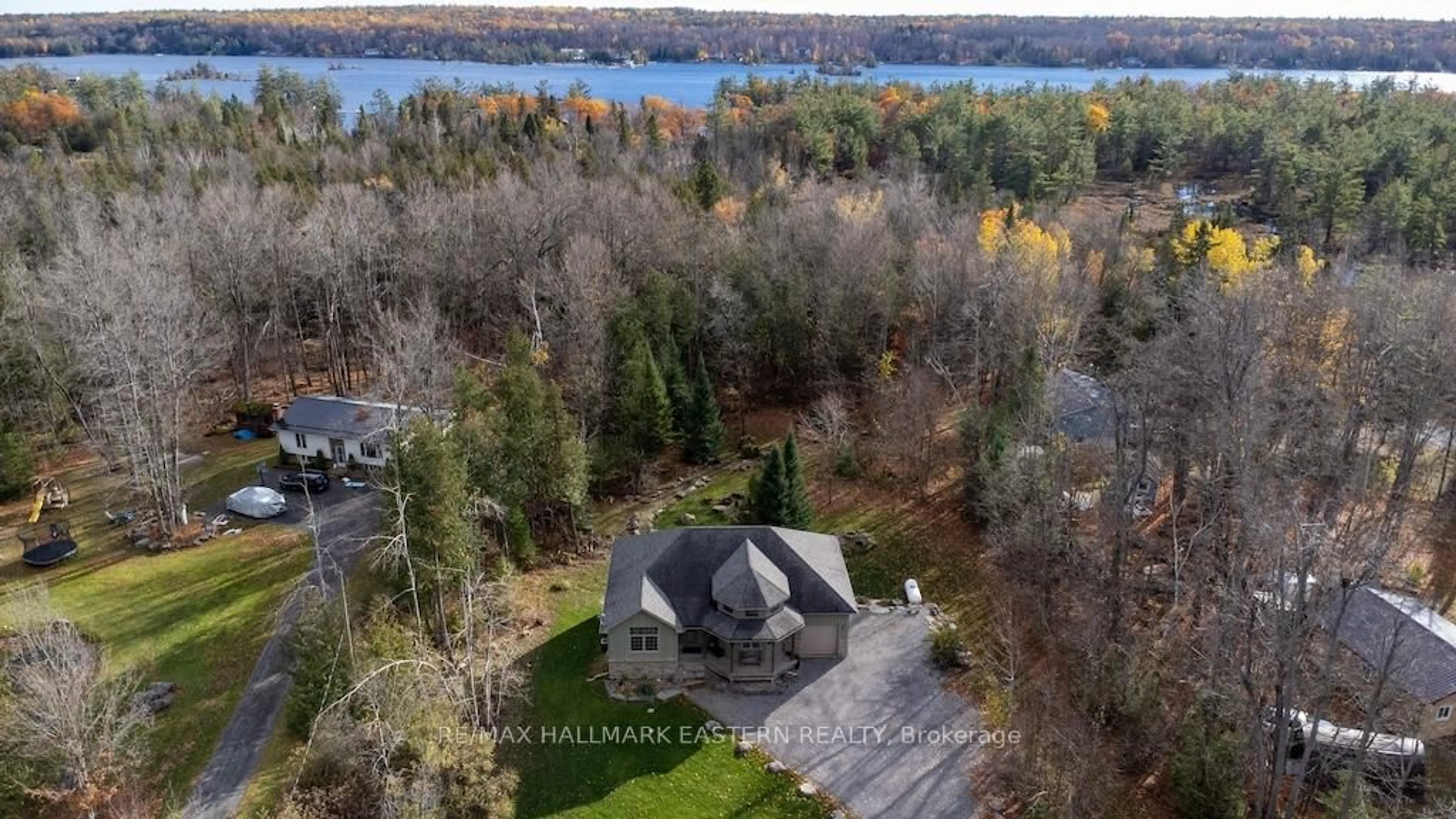 A pic from outside/outdoor area/front of a property/back of a property/a pic from drone, water/lake/river/ocean view for 3468 County Rd 36, Trent Lakes Ontario K0L 2H0