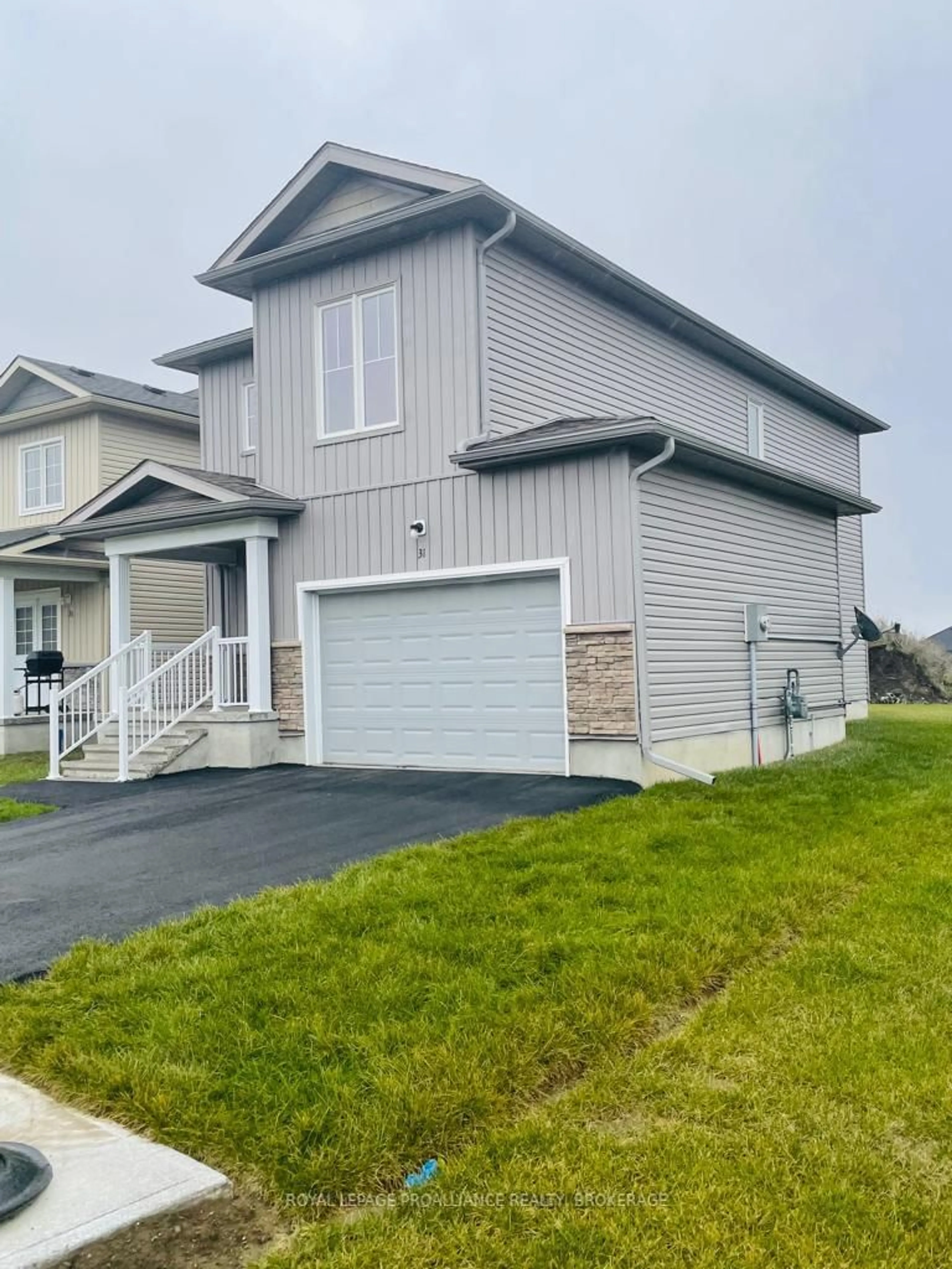 Home with vinyl exterior material, street for 31 Brennan Cres, Bissett Creek Ontario K0H 2H0