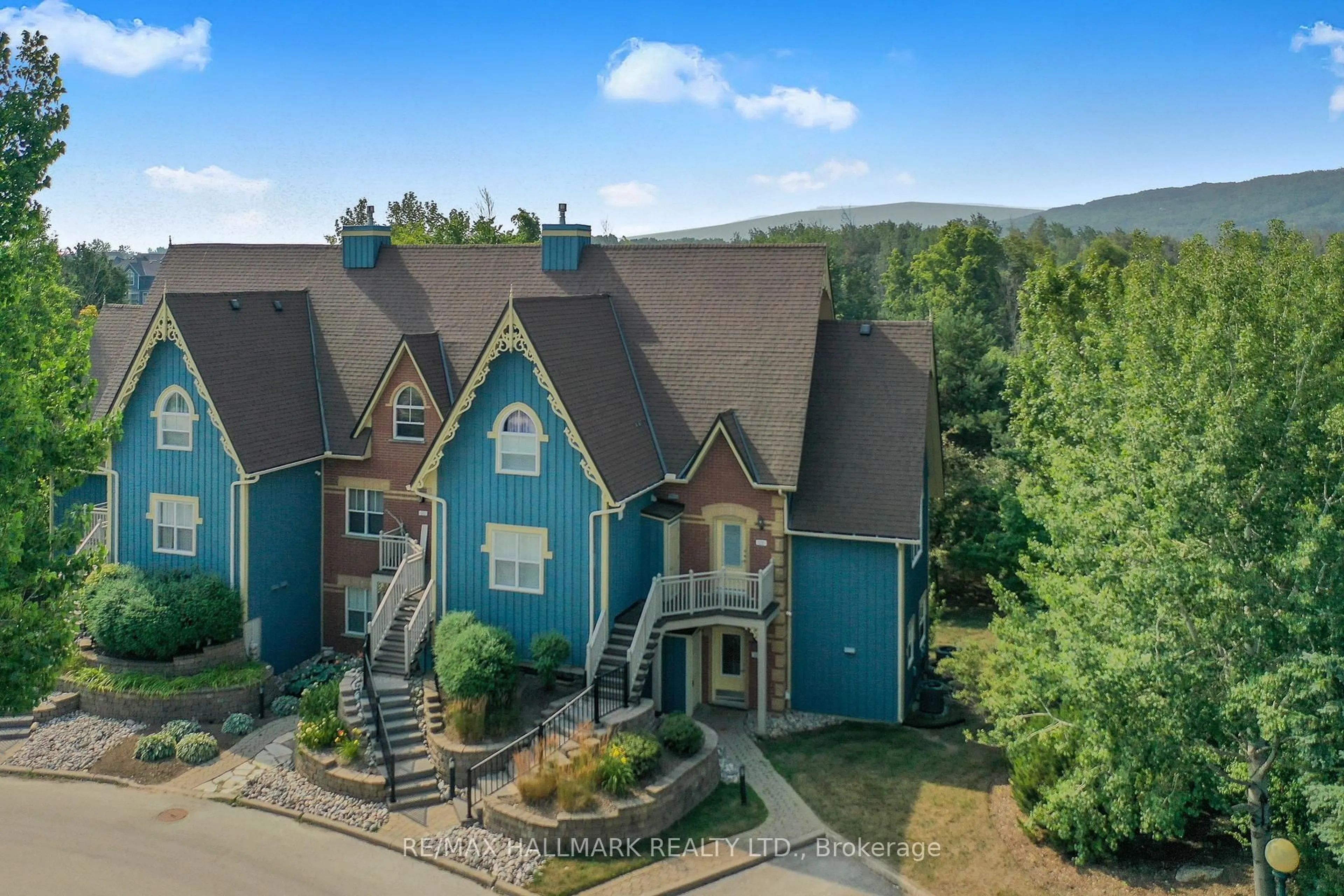 A pic from outside/outdoor area/front of a property/back of a property/a pic from drone, mountain view for 184 Snowbridge Way #101, Blue Mountains Ontario L9Y 0V1