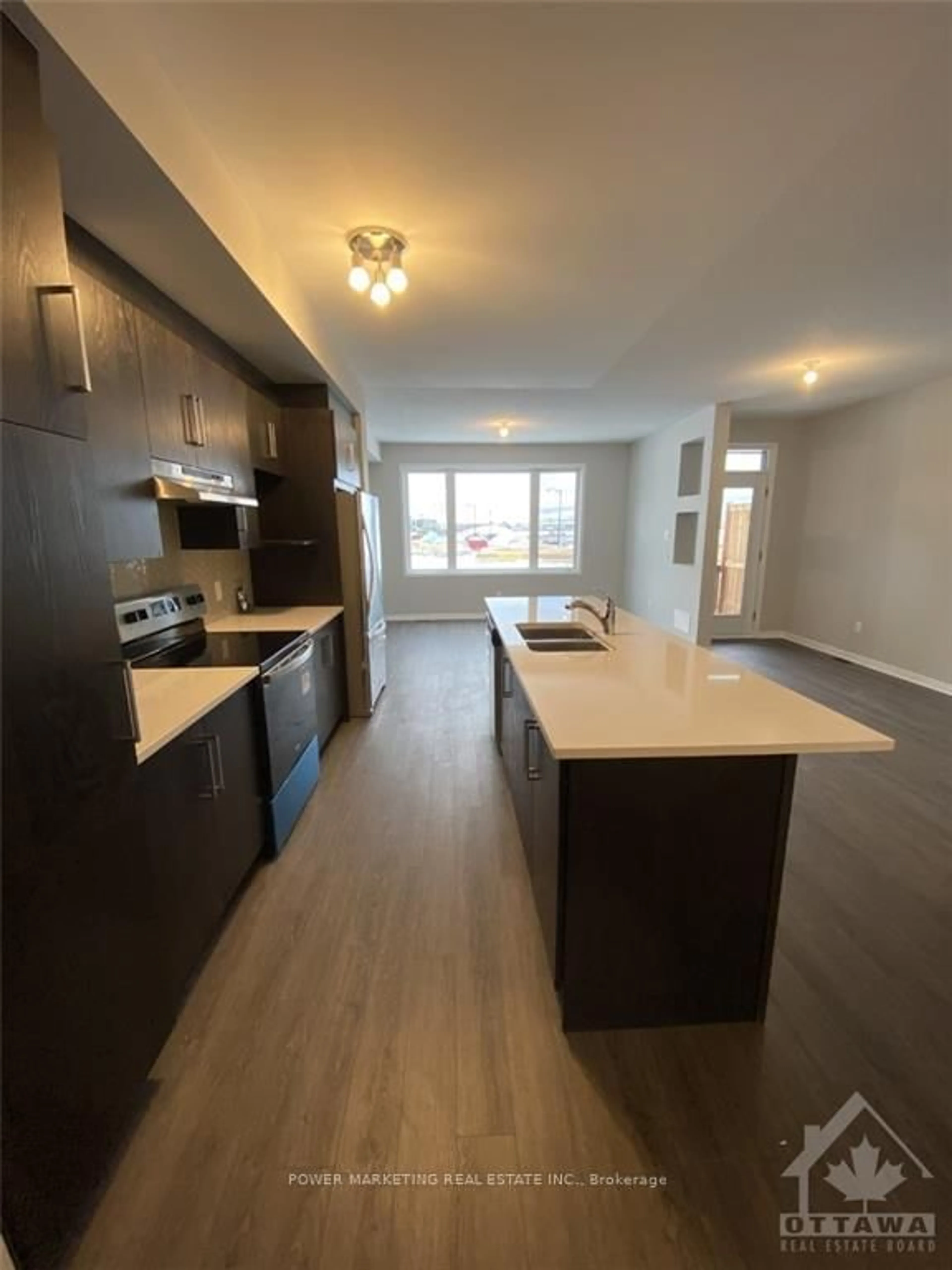 Open concept kitchen, wood/laminate floor for 487 COPE Dr, Ottawa Ontario K2S 1B6