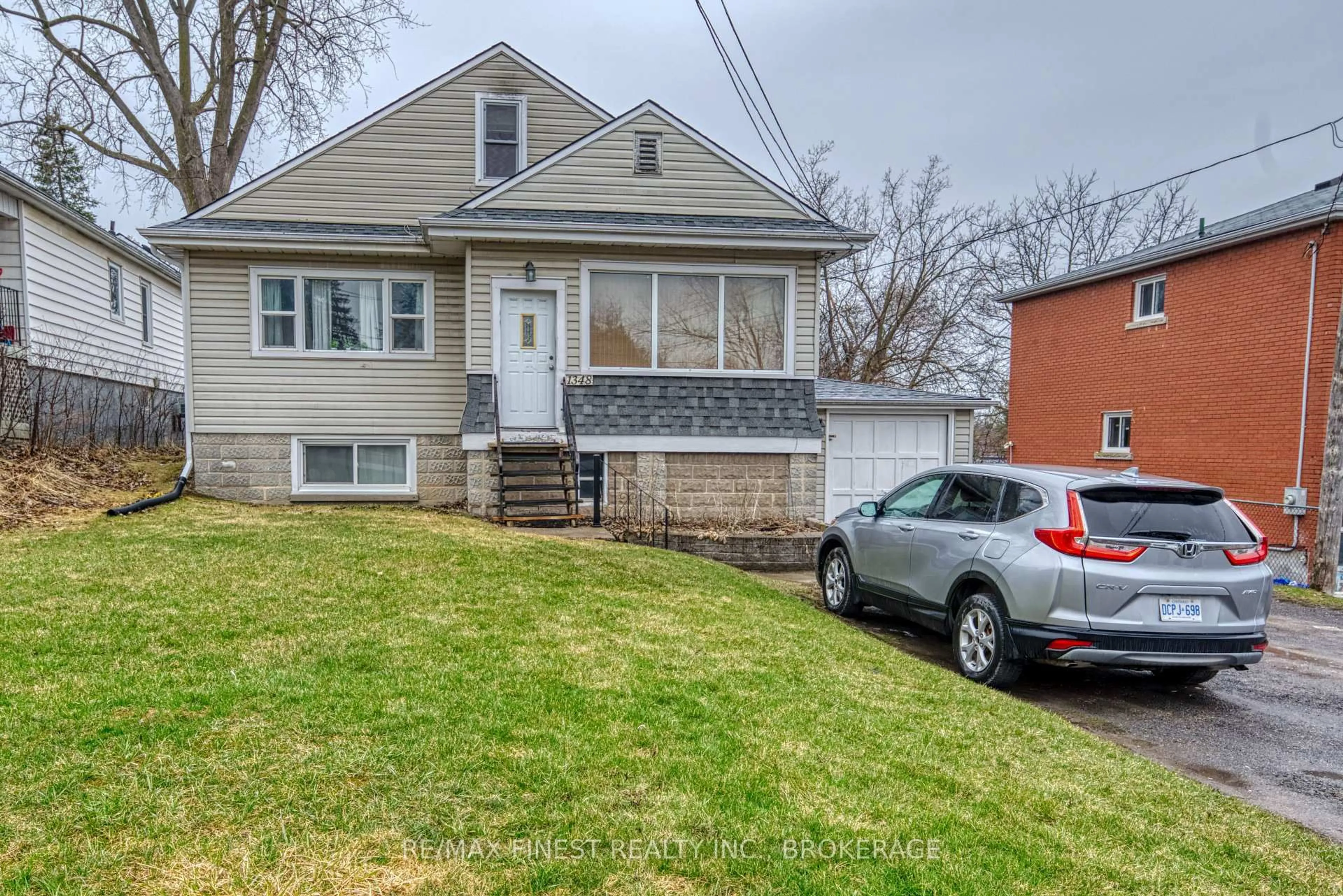 A pic from outside/outdoor area/front of a property/back of a property/a pic from drone, street for 1348 Princess St, Kingston Ontario K7M 3E2