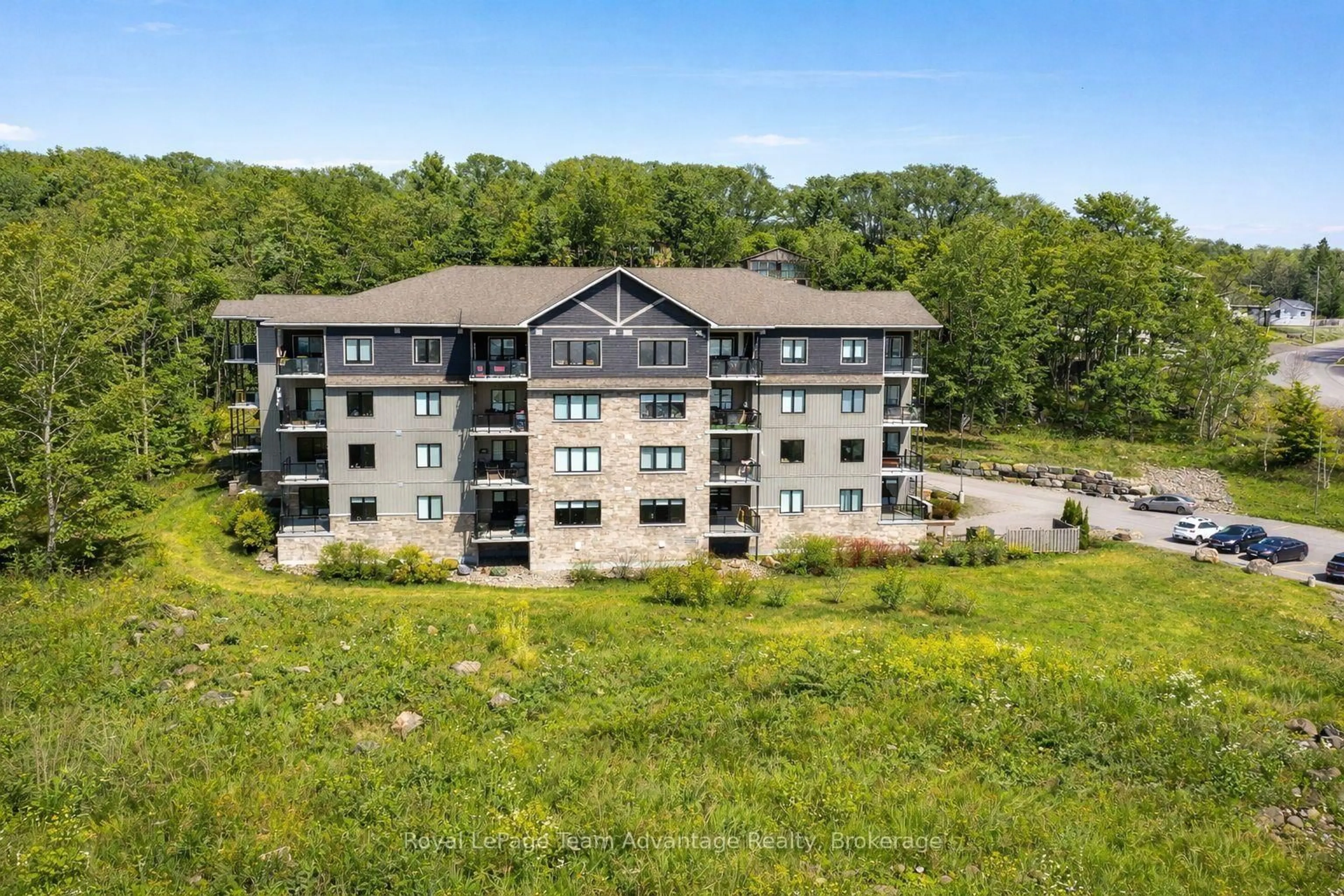 A pic from outside/outdoor area/front of a property/back of a property/a pic from drone, building for 11C Salt Dock Rd #201, Parry Sound Ontario P2A 3B6