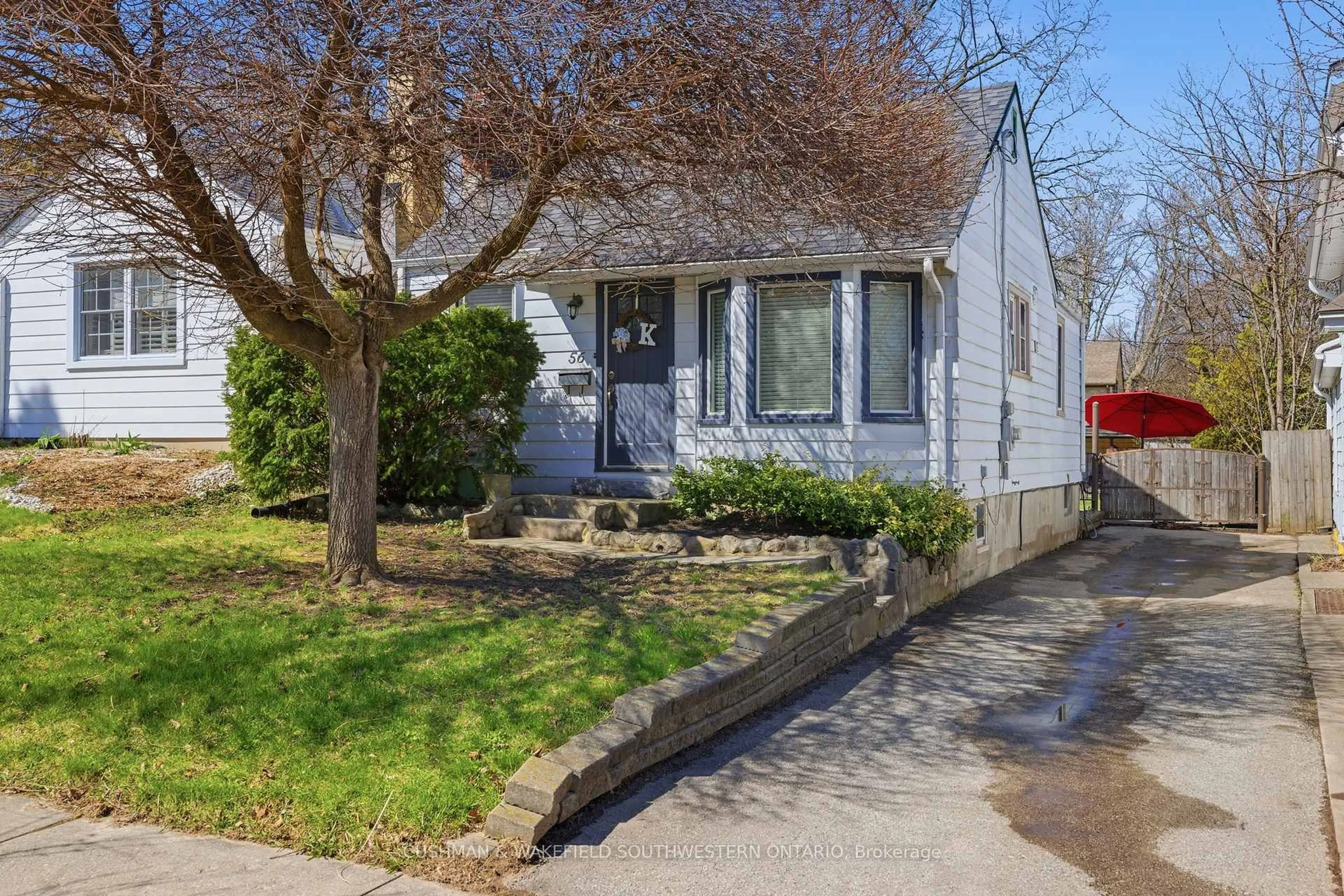 Home with vinyl exterior material, street for 56 Thomas Janes Dr, London South Ontario N6C 2G9