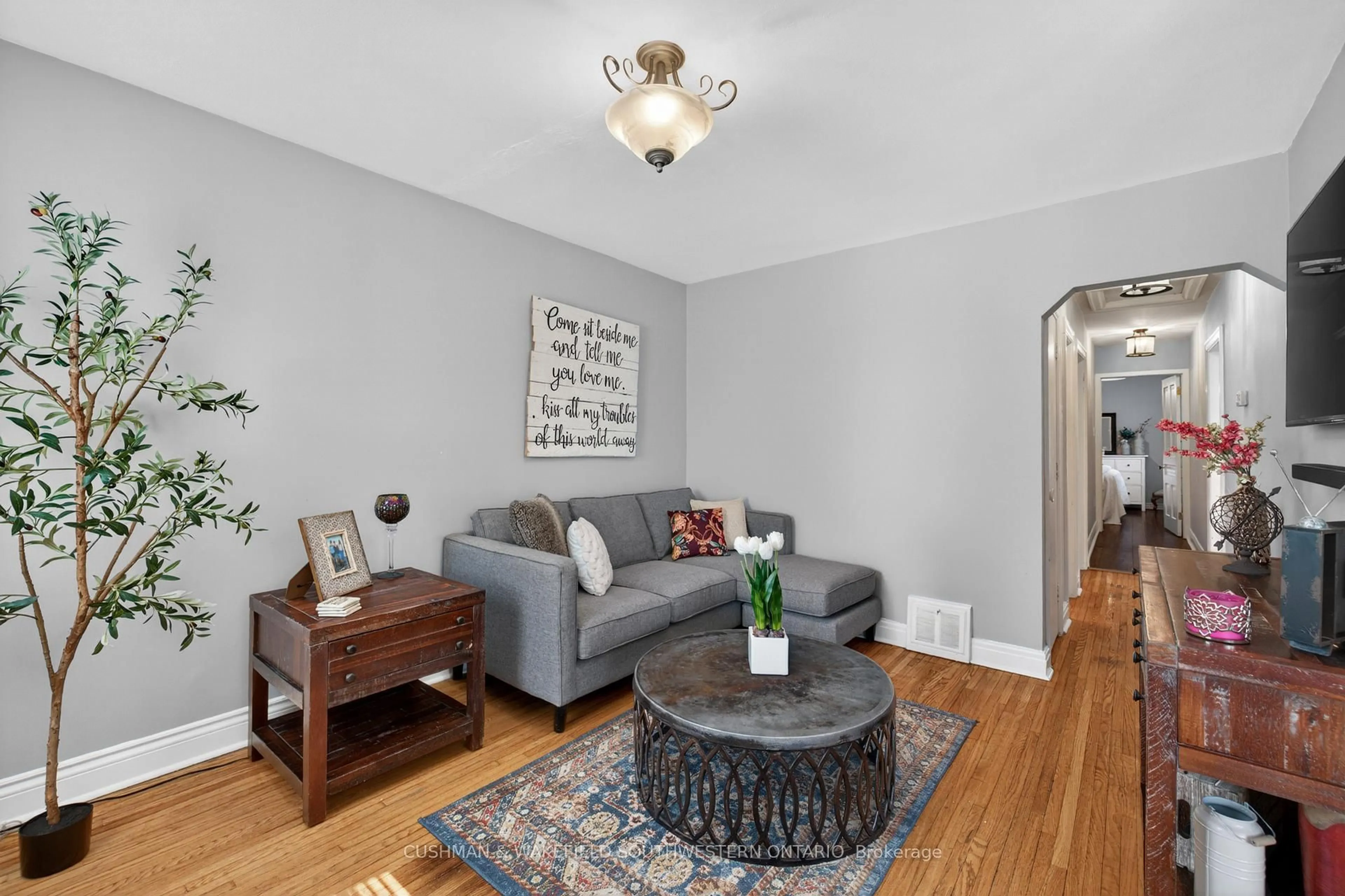 Living room with furniture, unknown for 56 Thomas Janes Dr, London South Ontario N6C 2G9