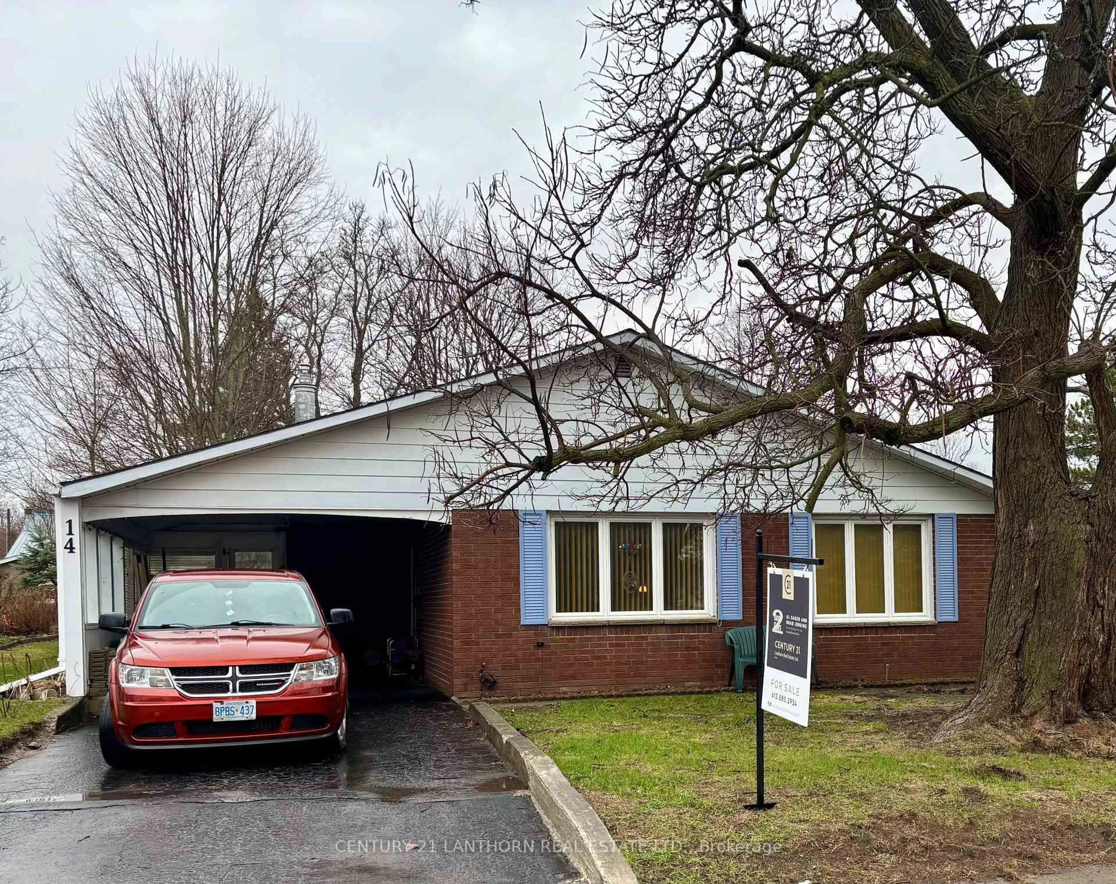 Home with brick exterior material, street for 14 Spring St, Prince Edward County Ontario K0K 2T0