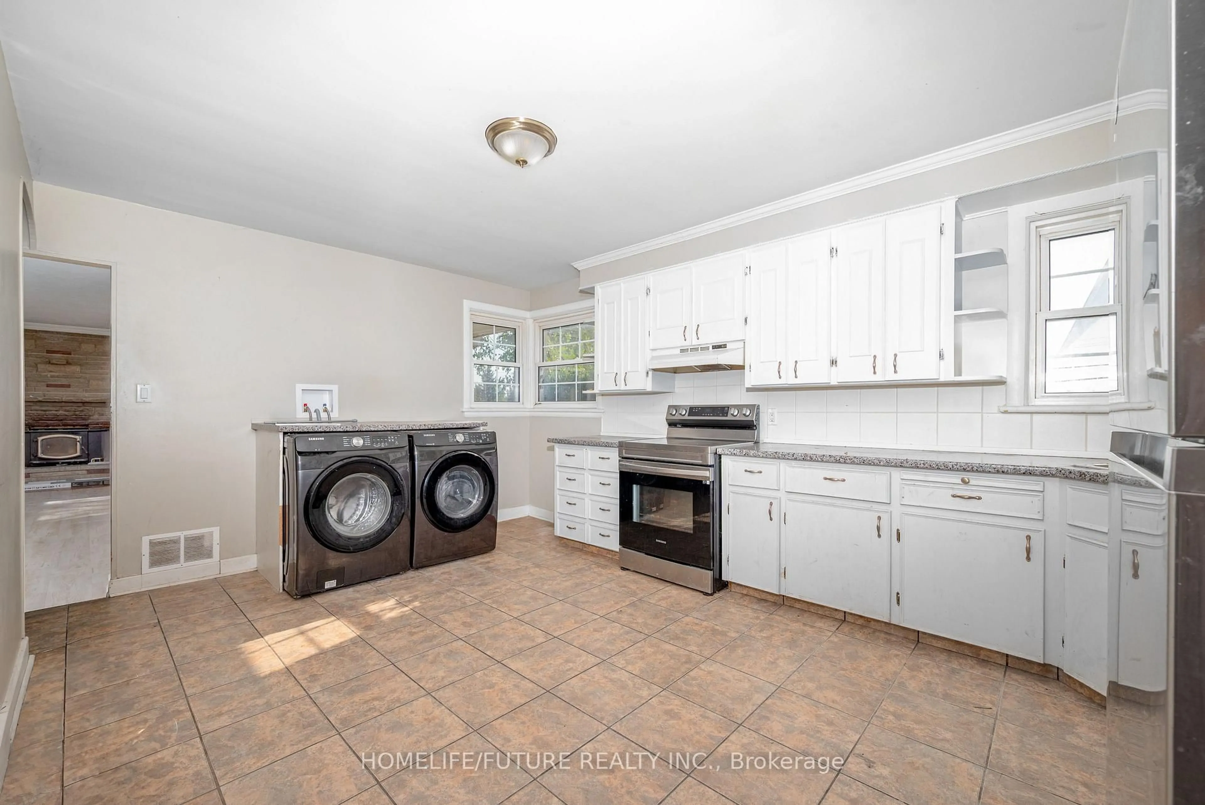 Kitchen with laundary machines, unknown for 4045 Hwy 35, Kawartha Lakes Ontario K0M 1G0