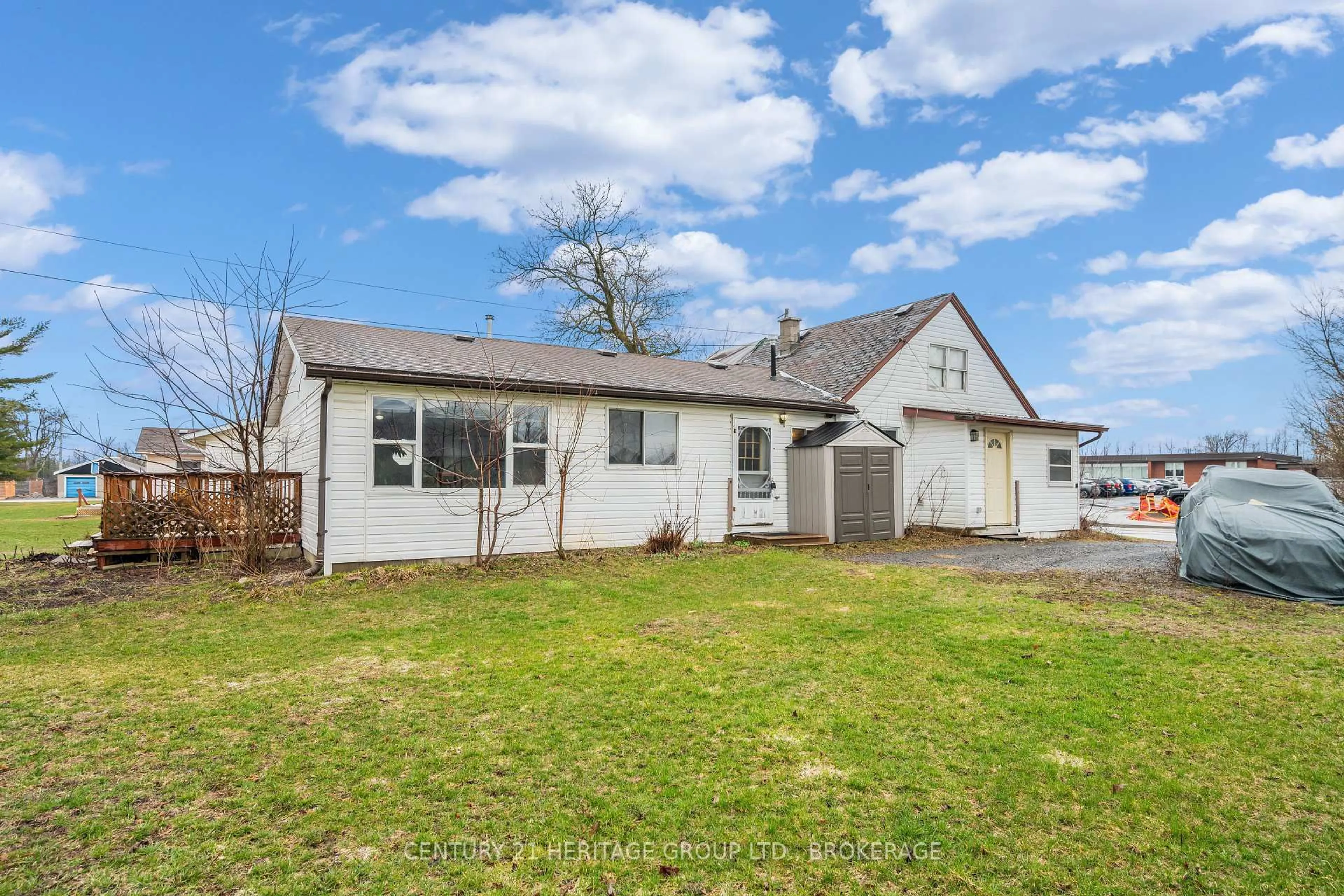 A pic from outside/outdoor area/front of a property/back of a property/a pic from drone, street for 11 North St, Bissett Creek Ontario K0H 2H0