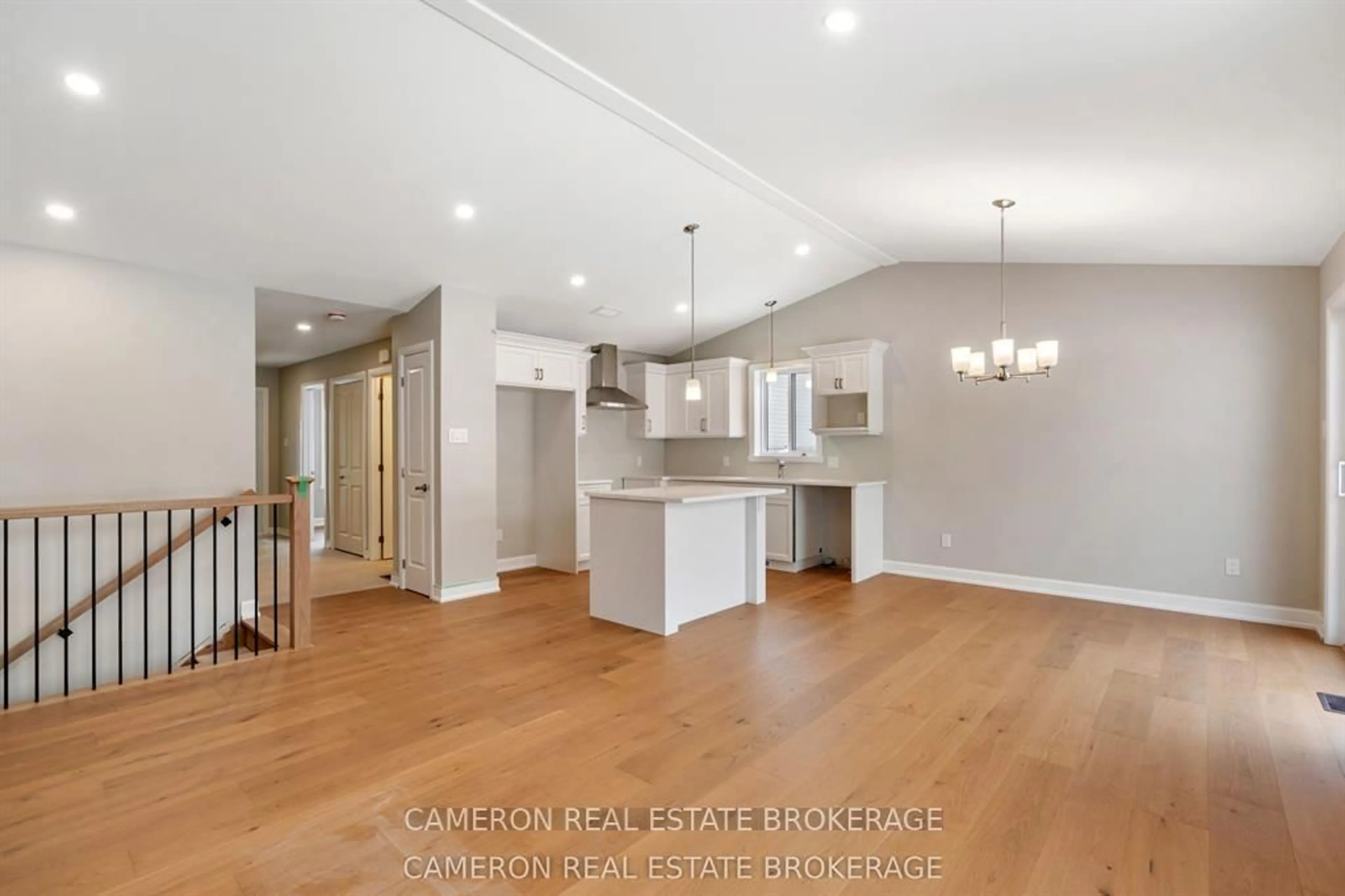 Open concept kitchen, wood/laminate floor for 3153 Mauricy St, Cornwall Ontario K6K 0A1