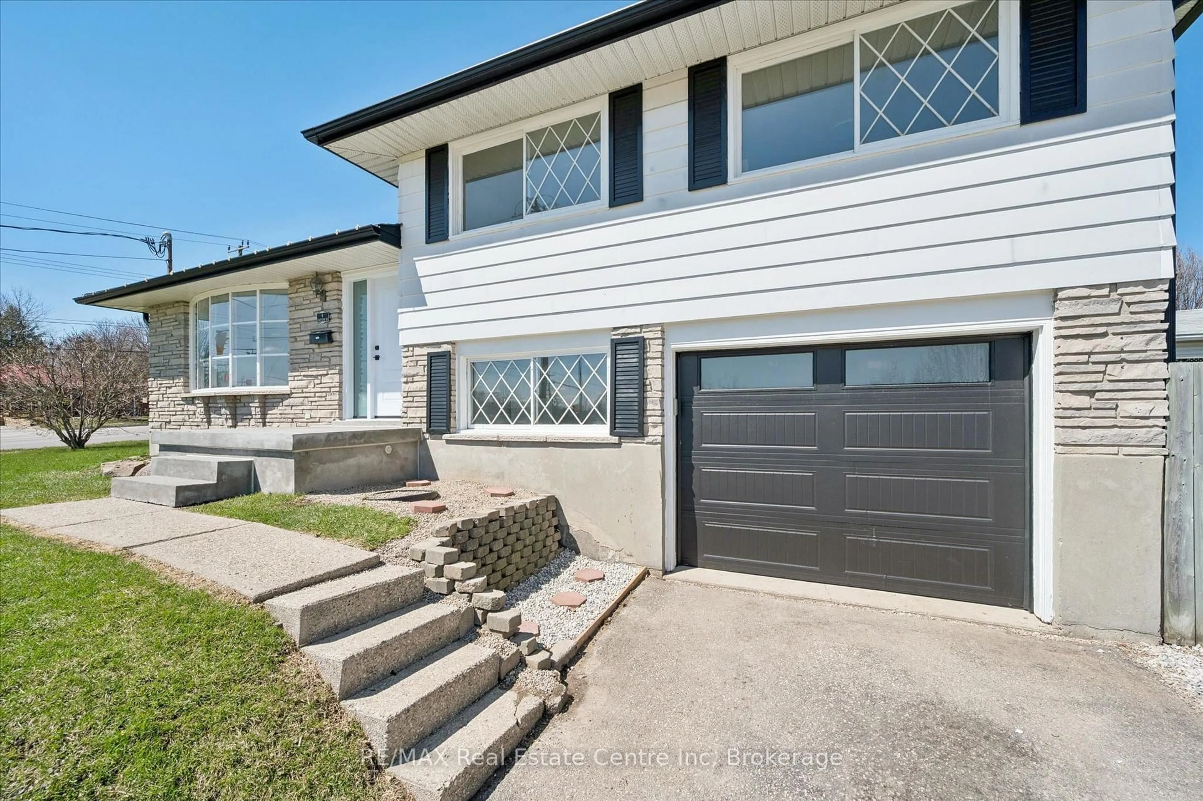 Home with vinyl exterior material, street for 6 Eastview Rd, Guelph Ontario N1E 1Z4