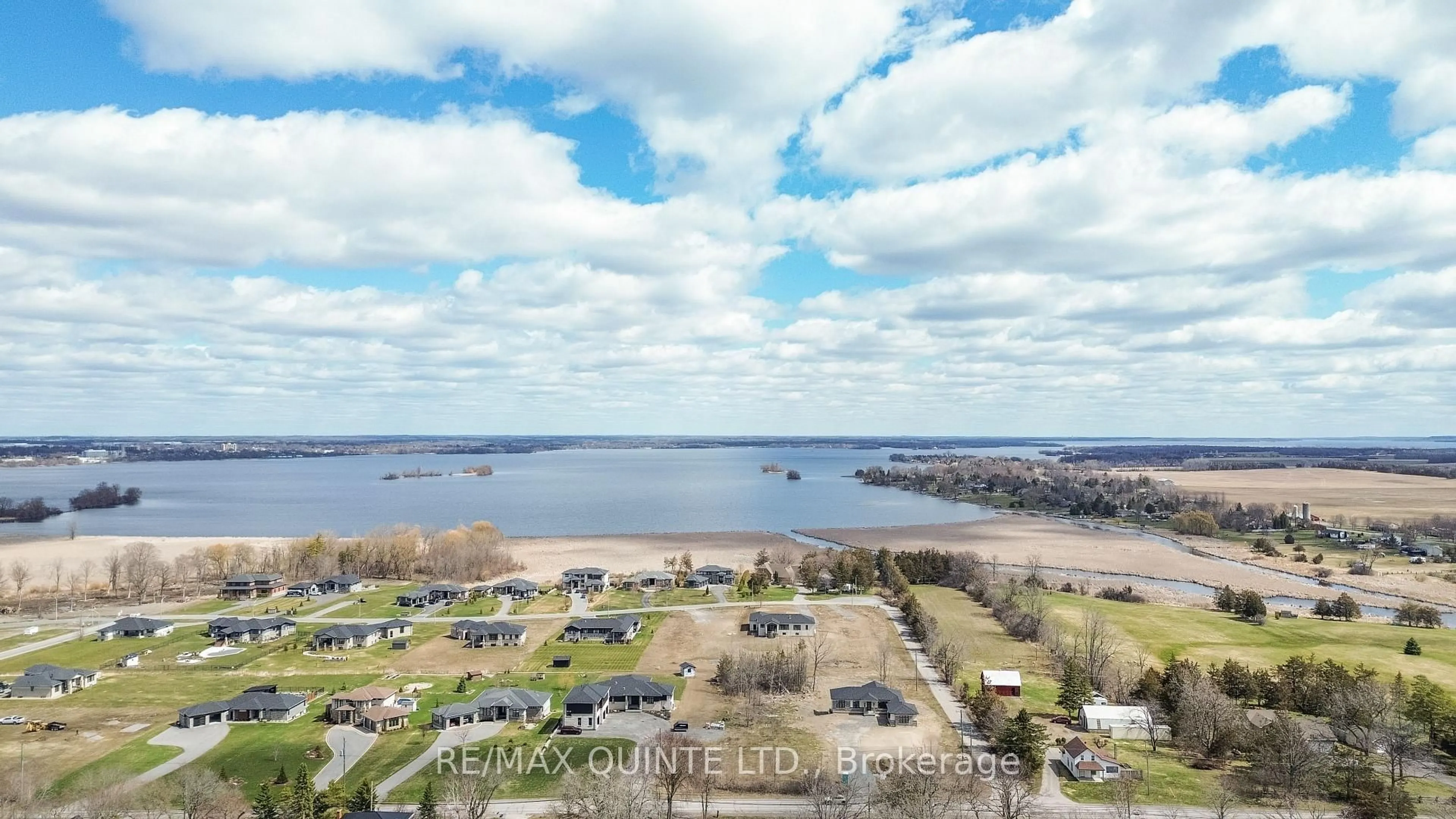 A pic from outside/outdoor area/front of a property/back of a property/a pic from drone, water/lake/river/ocean view for 638 County Road 28, Prince Edward County Ontario K0K 1A0