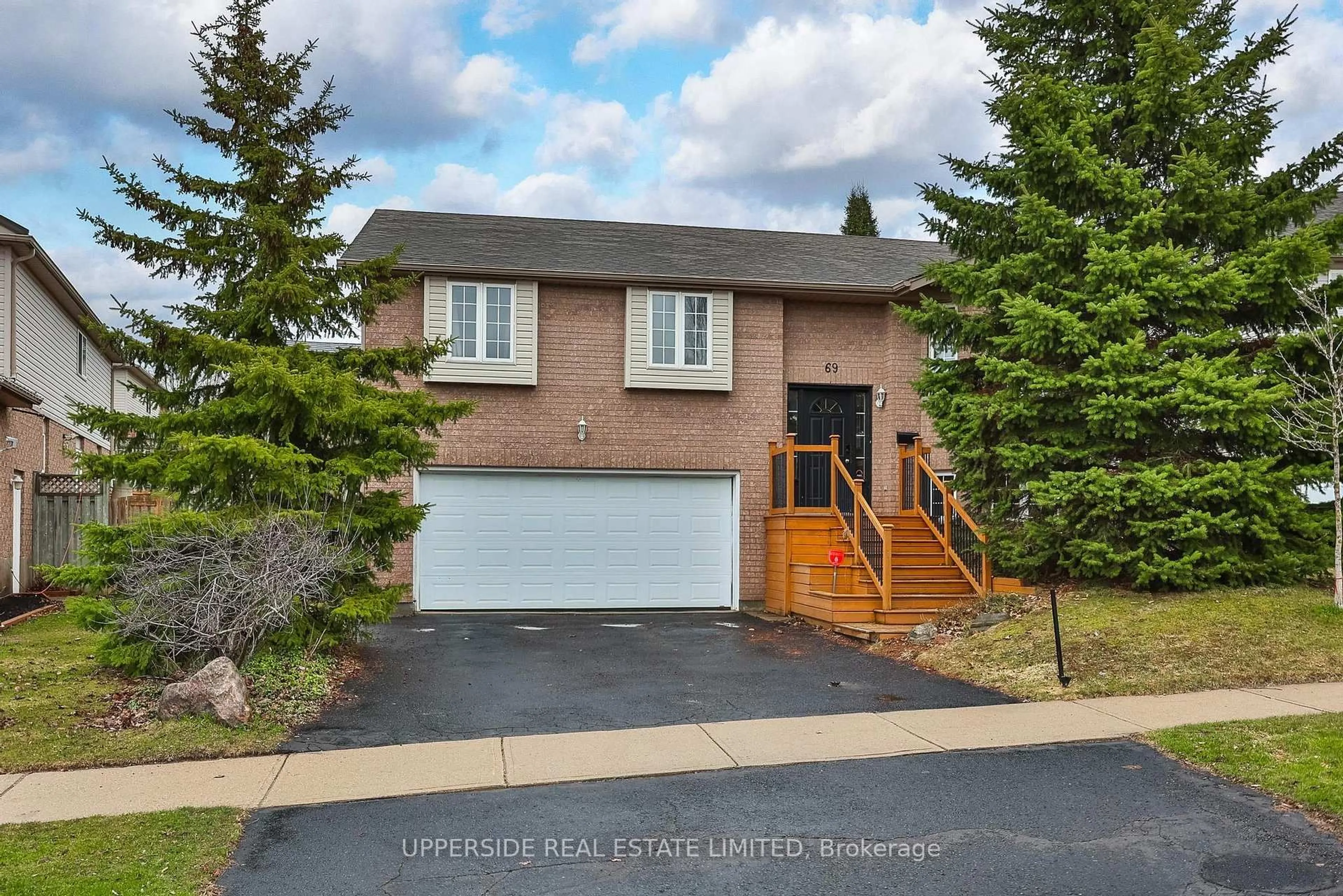 Home with brick exterior material, street for 69 Abbeywood Cres, Guelph Ontario N1K 1V3