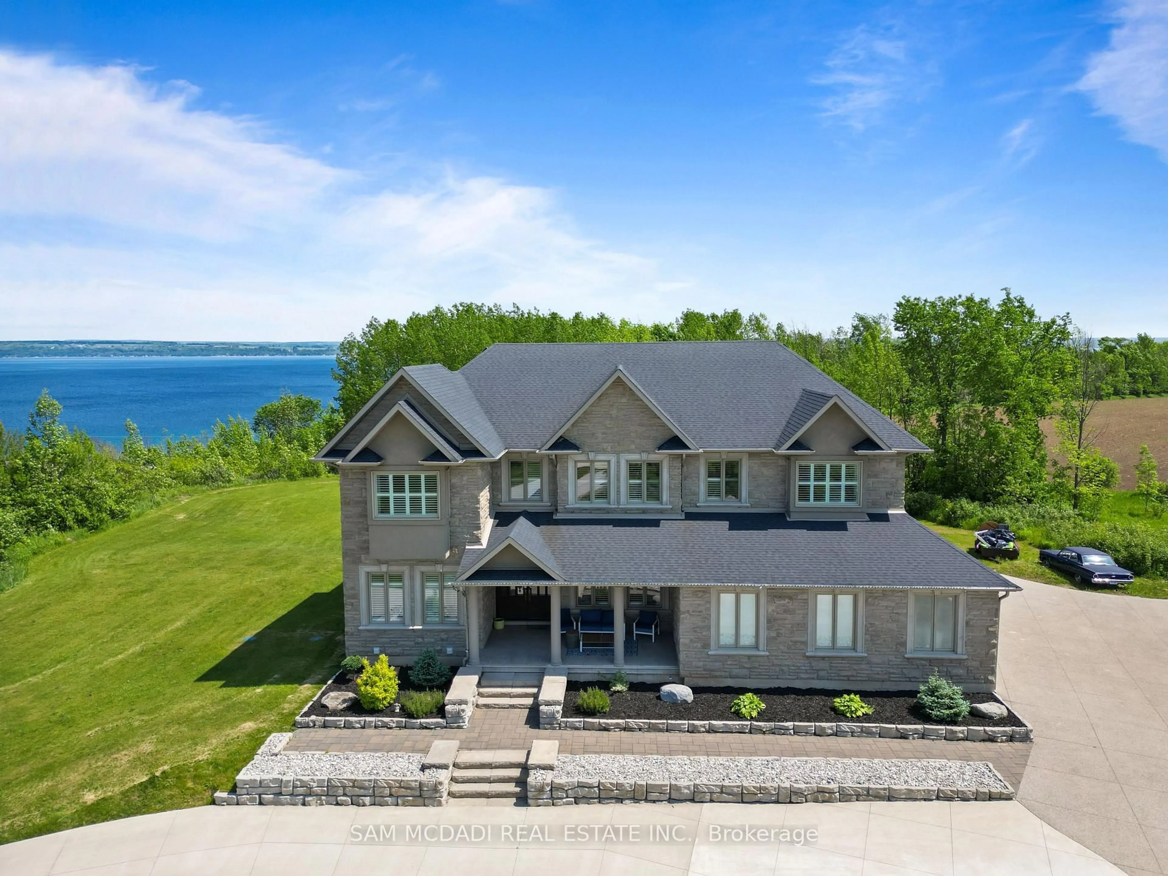 A pic from outside/outdoor area/front of a property/back of a property/a pic from drone, water/lake/river/ocean view for 119 Ishwar Dr, Georgian Bluffs Ontario N0H 1S0