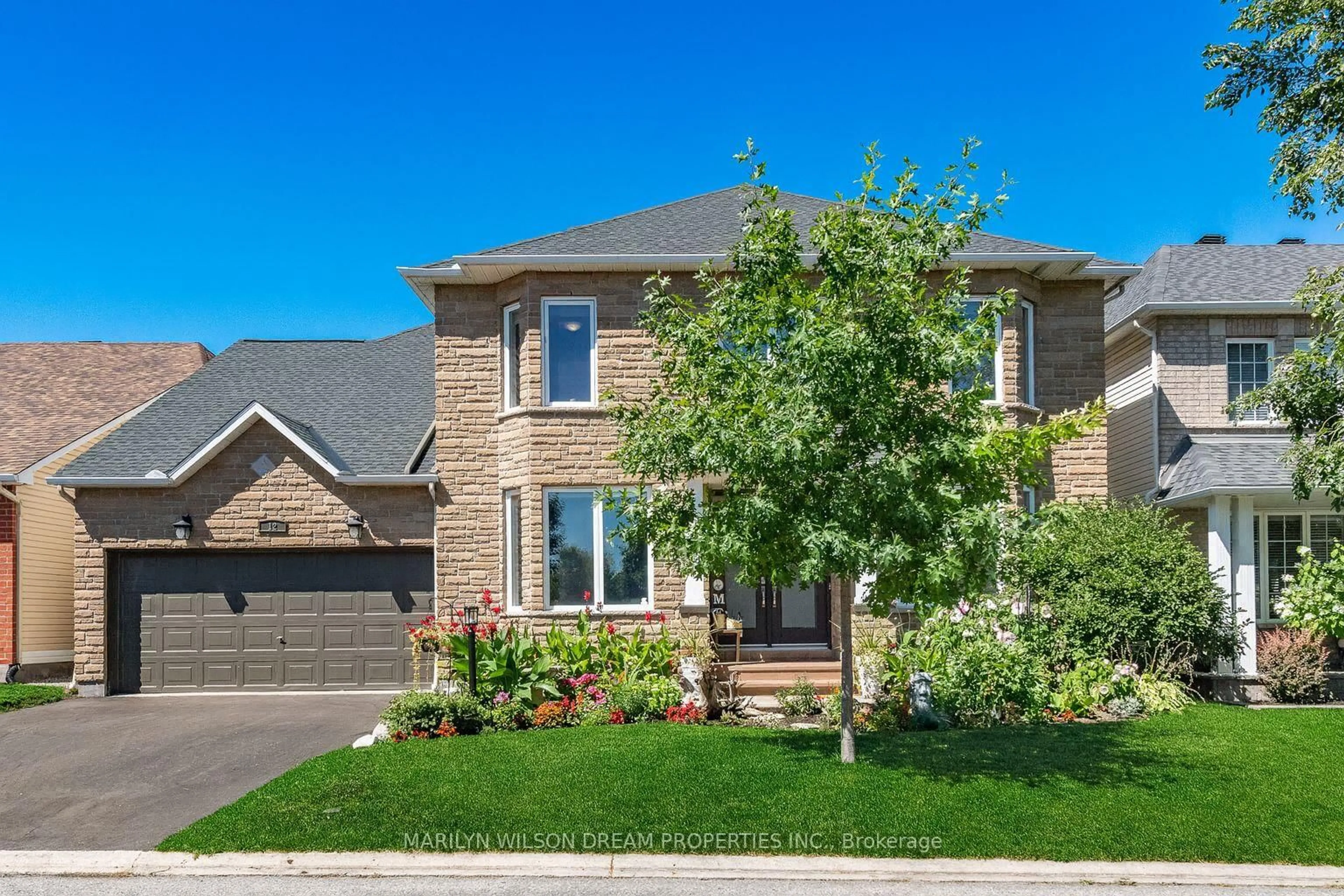 Home with brick exterior material, street for 12 Greenpointe Dr, Ottawa Ontario K2J 4T9