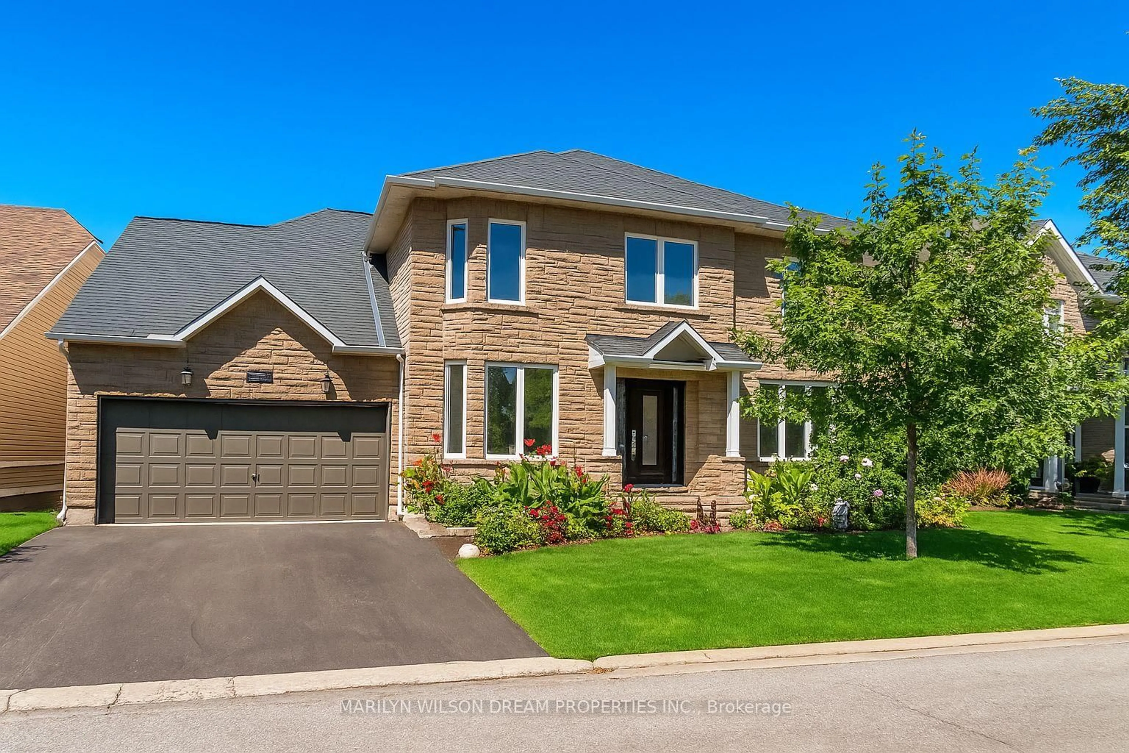 Home with brick exterior material, street for 12 Greenpointe Dr, Ottawa Ontario K2J 4T9