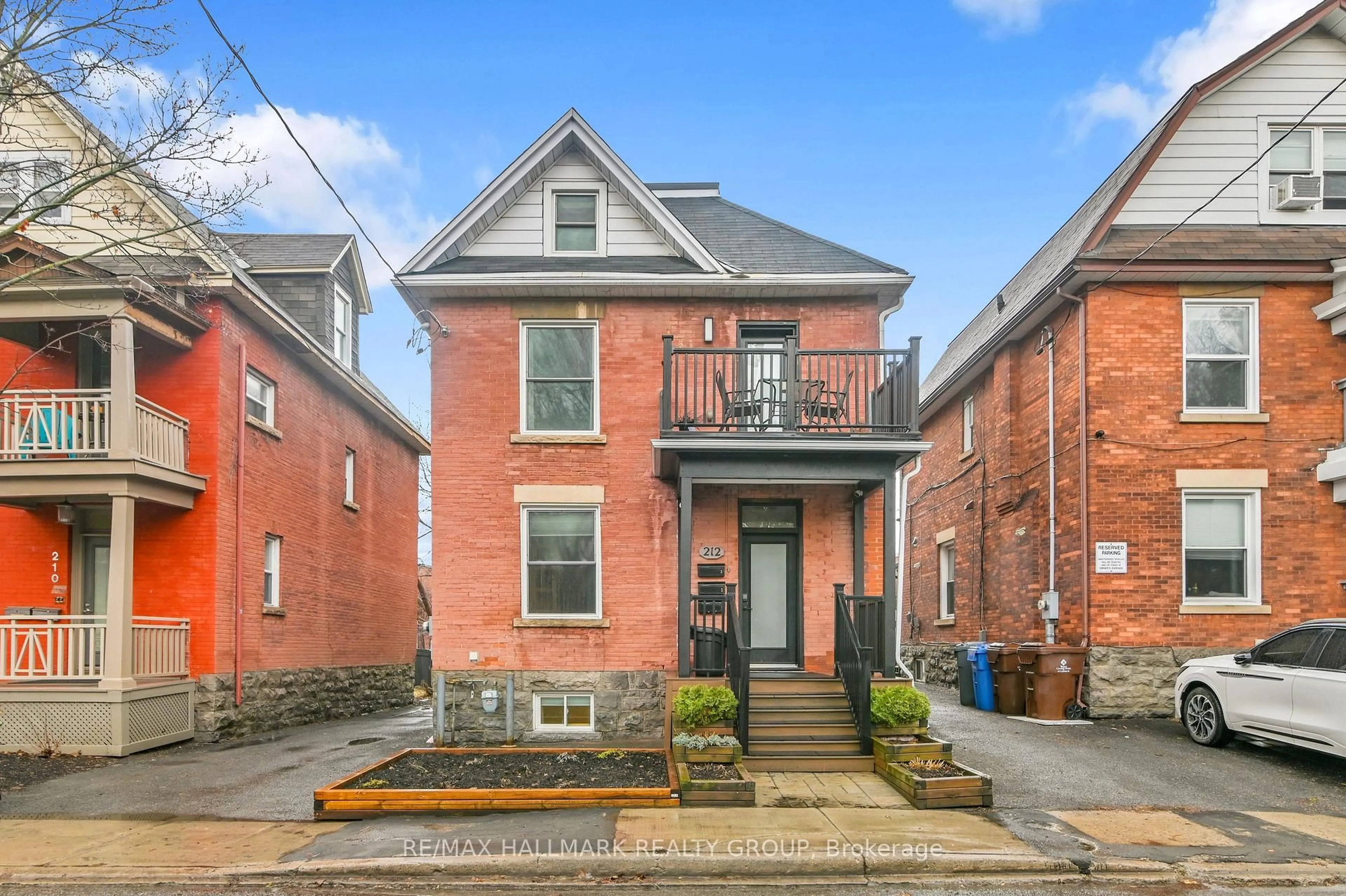 Home with brick exterior material, street for 212 Flora St, Ottawa Ontario K1R 5R7