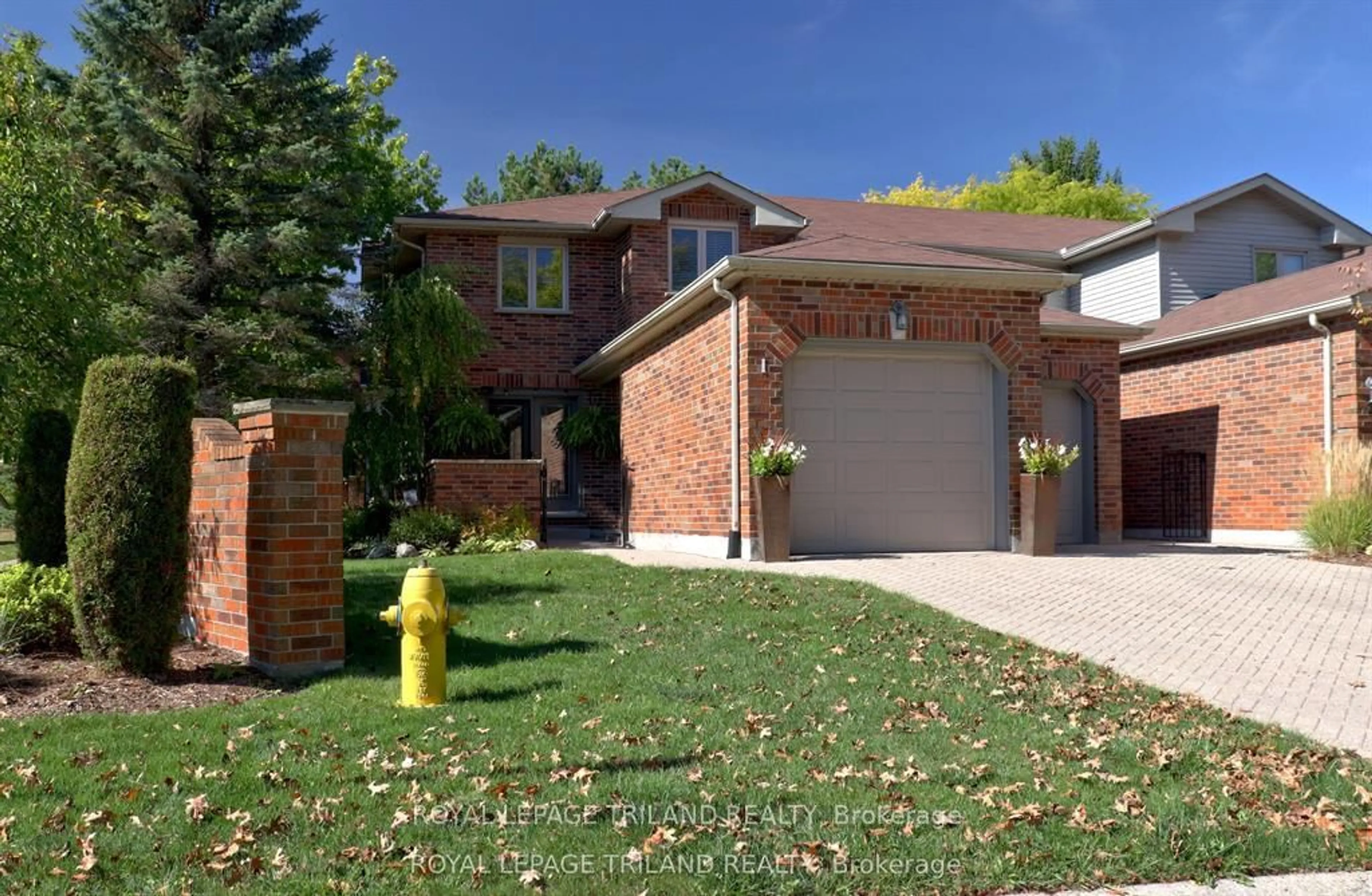 Home with brick exterior material, street for 70 Sunnyside Dr #1, London North Ontario N5X 3W4