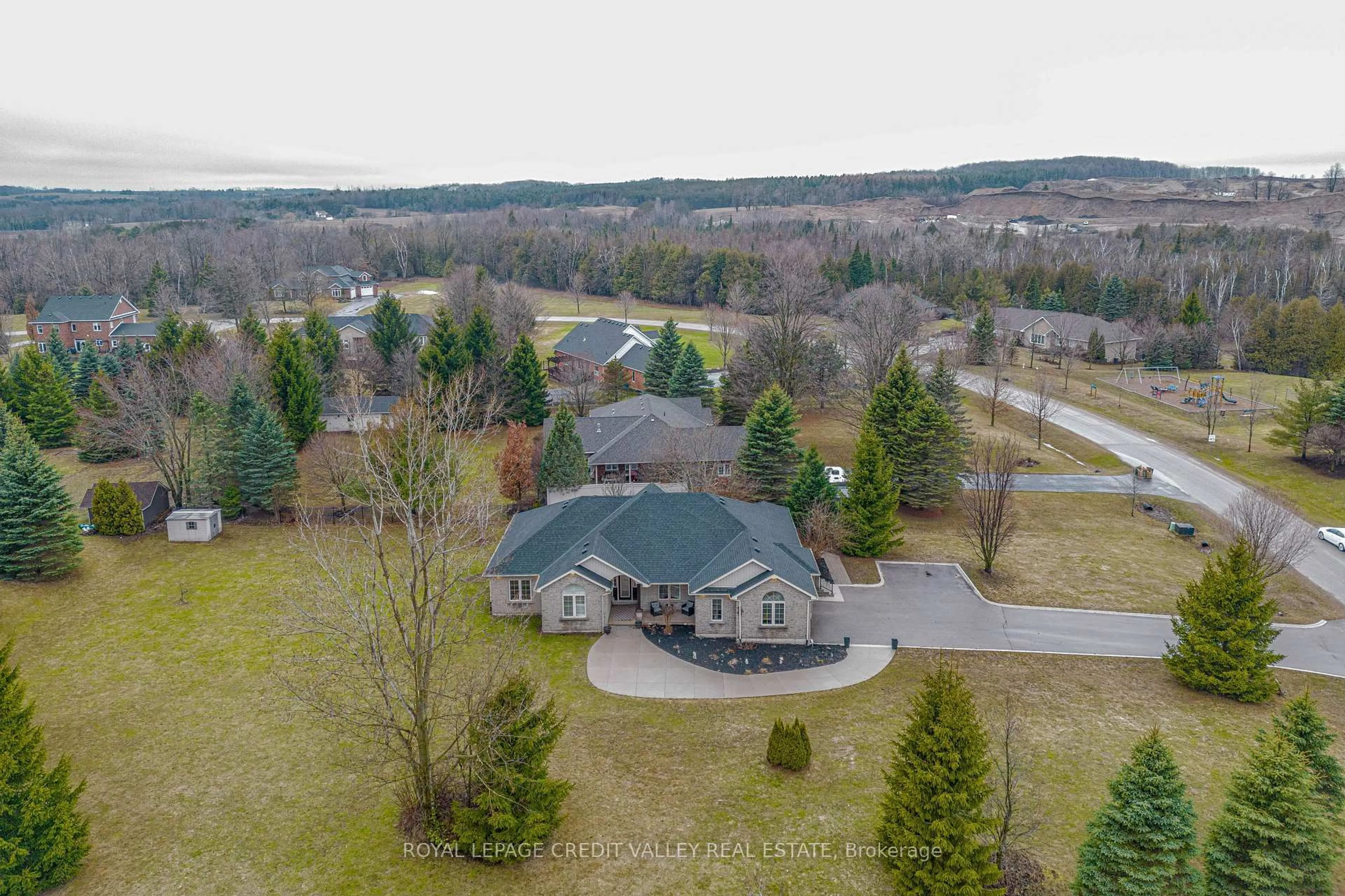 A pic from outside/outdoor area/front of a property/back of a property/a pic from drone, unknown for 48 Rayburn Meadows Rd, East Garafraxa Ontario L9W 7E7