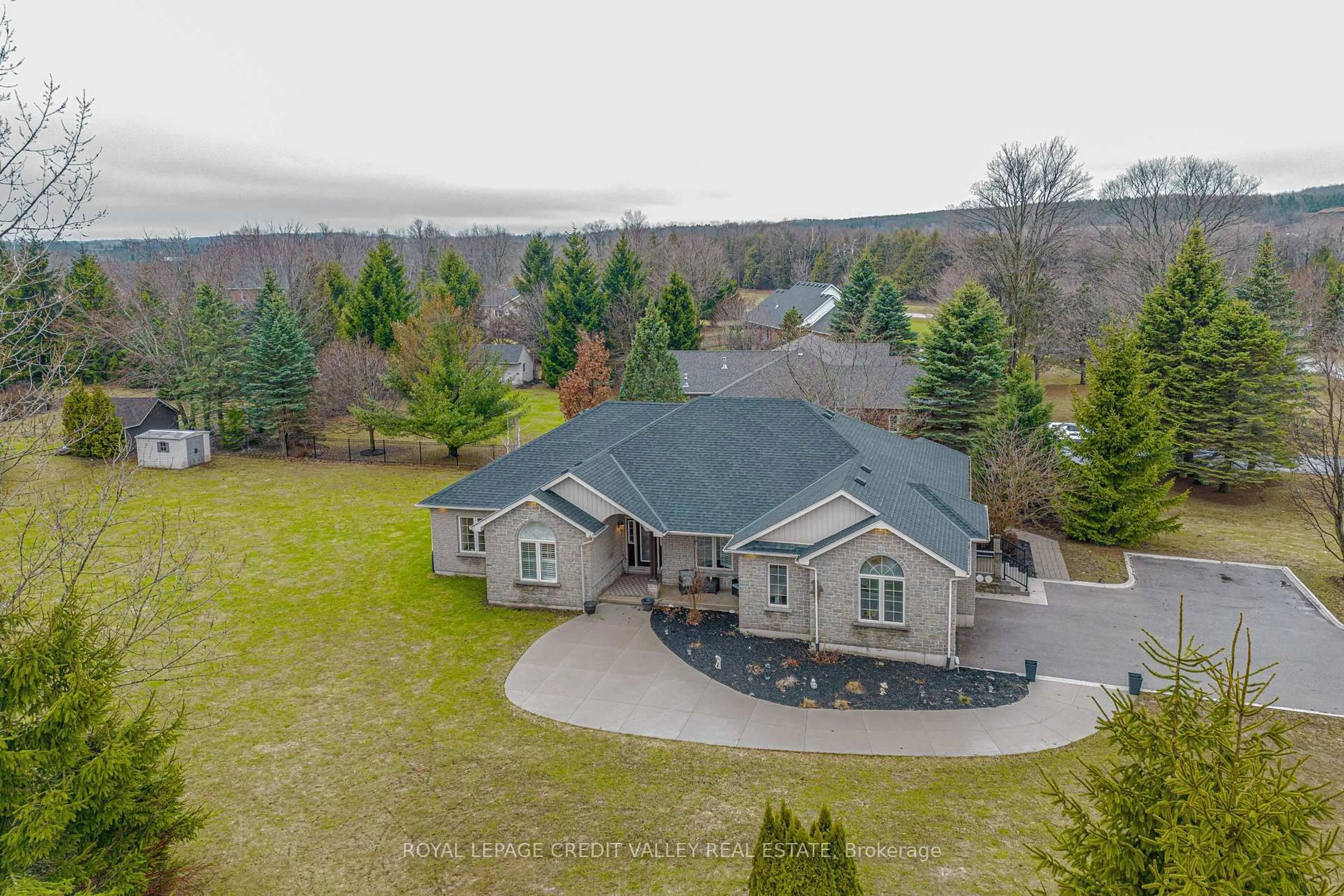 A pic from outside/outdoor area/front of a property/back of a property/a pic from drone, unknown for 48 Rayburn Meadows Rd, East Garafraxa Ontario L9W 7E7