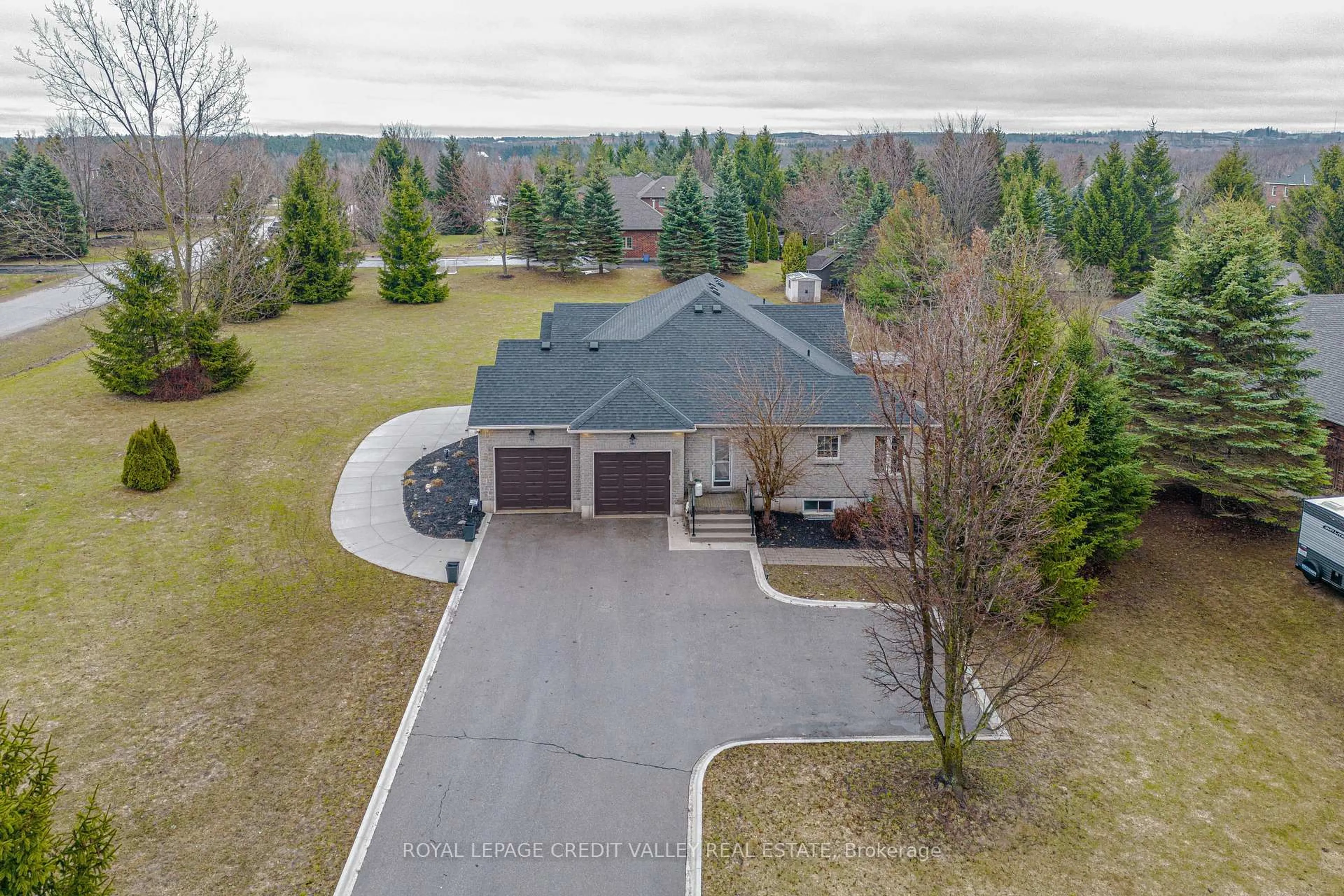 A pic from outside/outdoor area/front of a property/back of a property/a pic from drone, street for 48 Rayburn Meadows Rd, East Garafraxa Ontario L9W 7E7