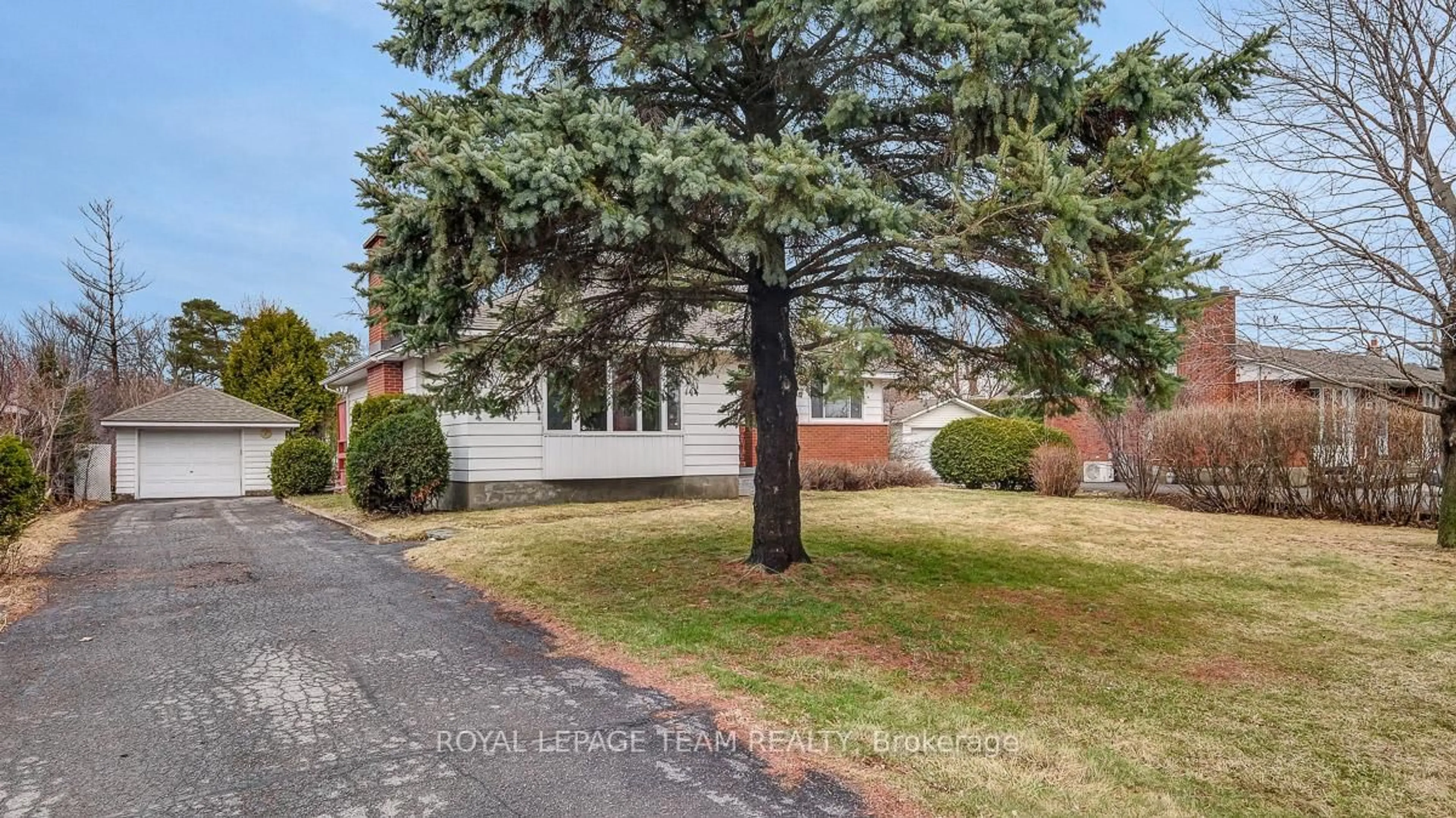 Home with brick exterior material, street for 1107 Falaise Rd, Ottawa Ontario K2E 6R1