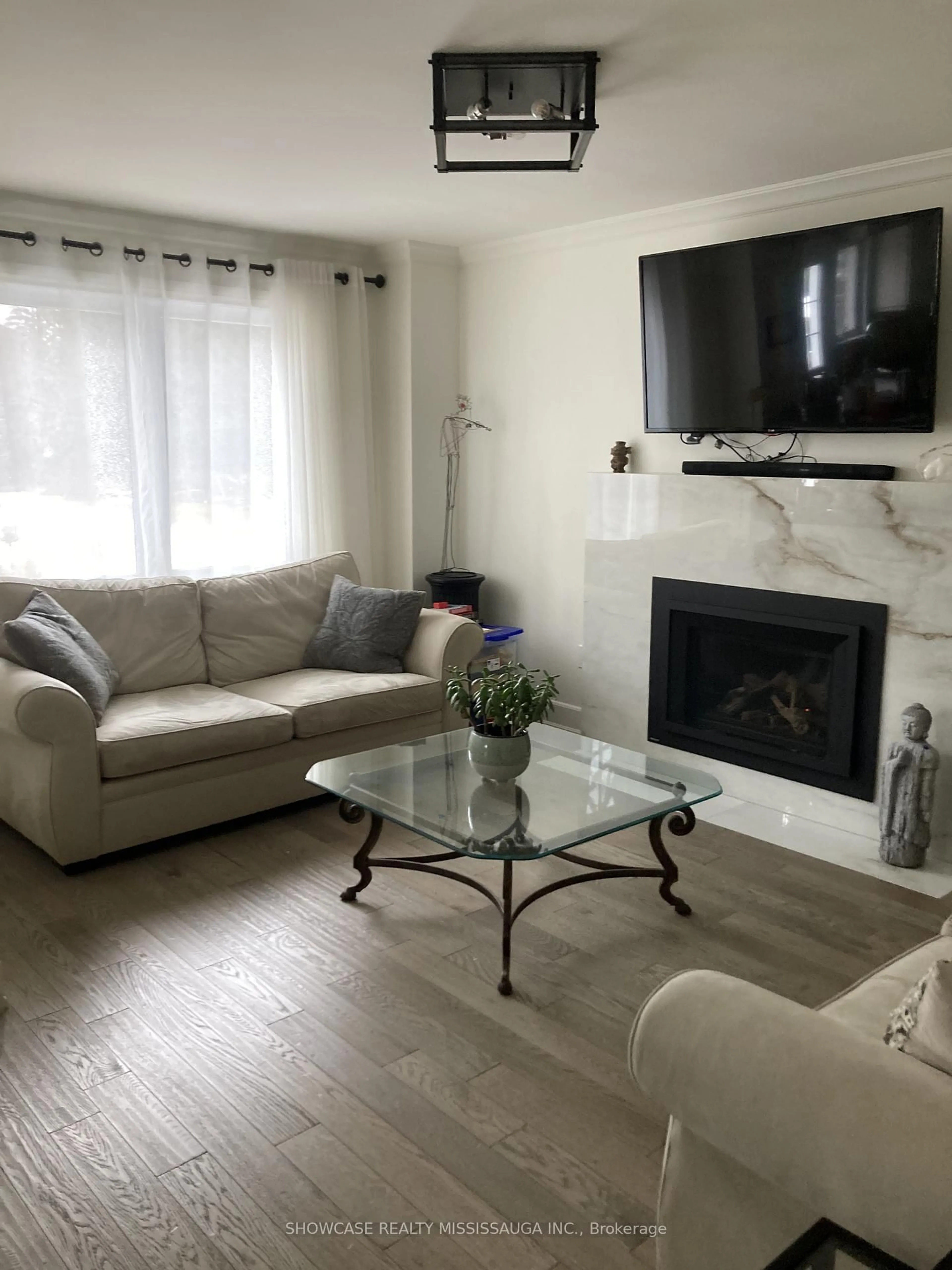Living room with furniture, wood/laminate floor for 2 Old Oak Lane, Mono Ontario L9W 4B1