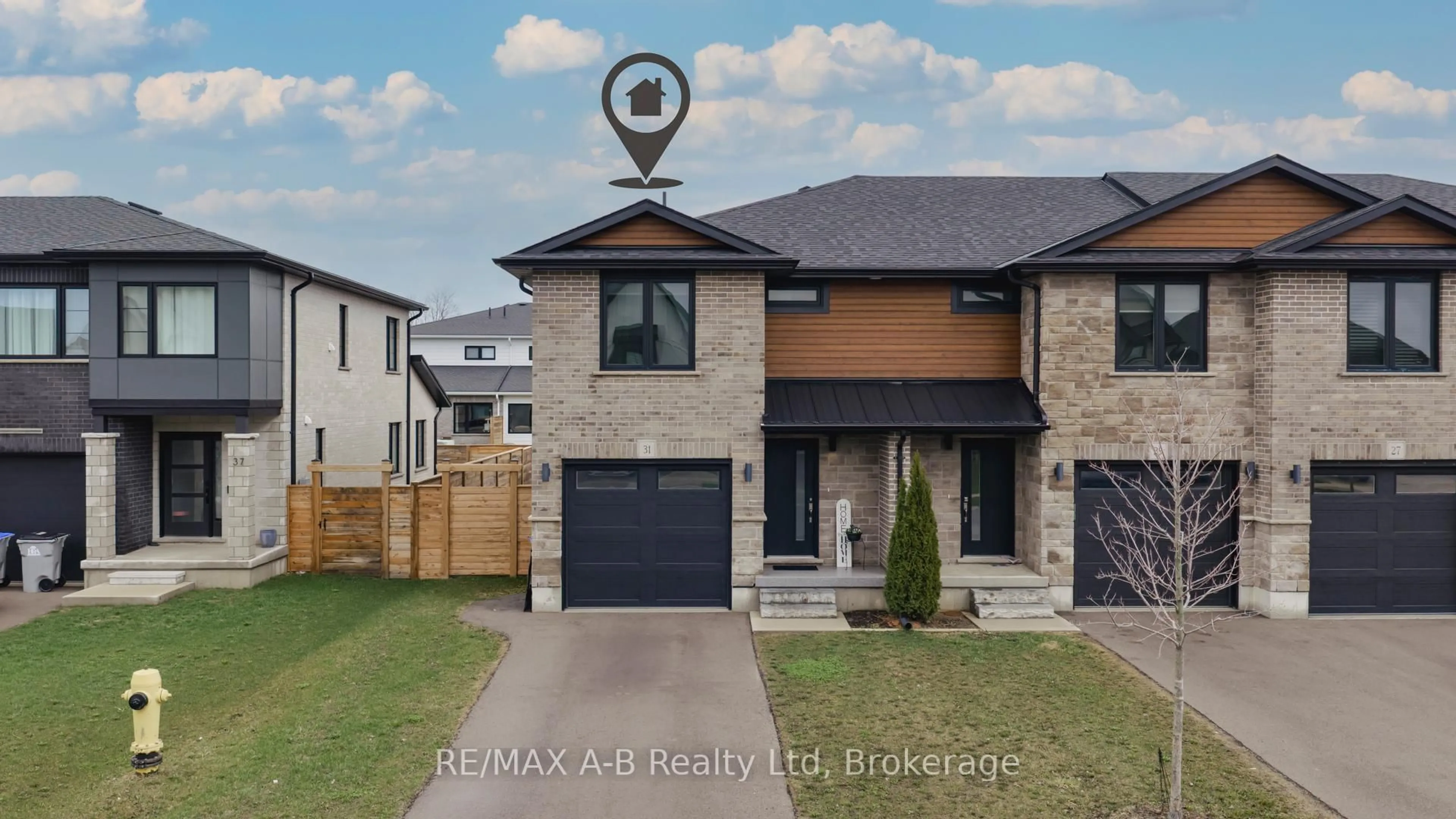 Home with brick exterior material, street for 31 Trailside Dr, St. Marys Ontario N4X 0C1