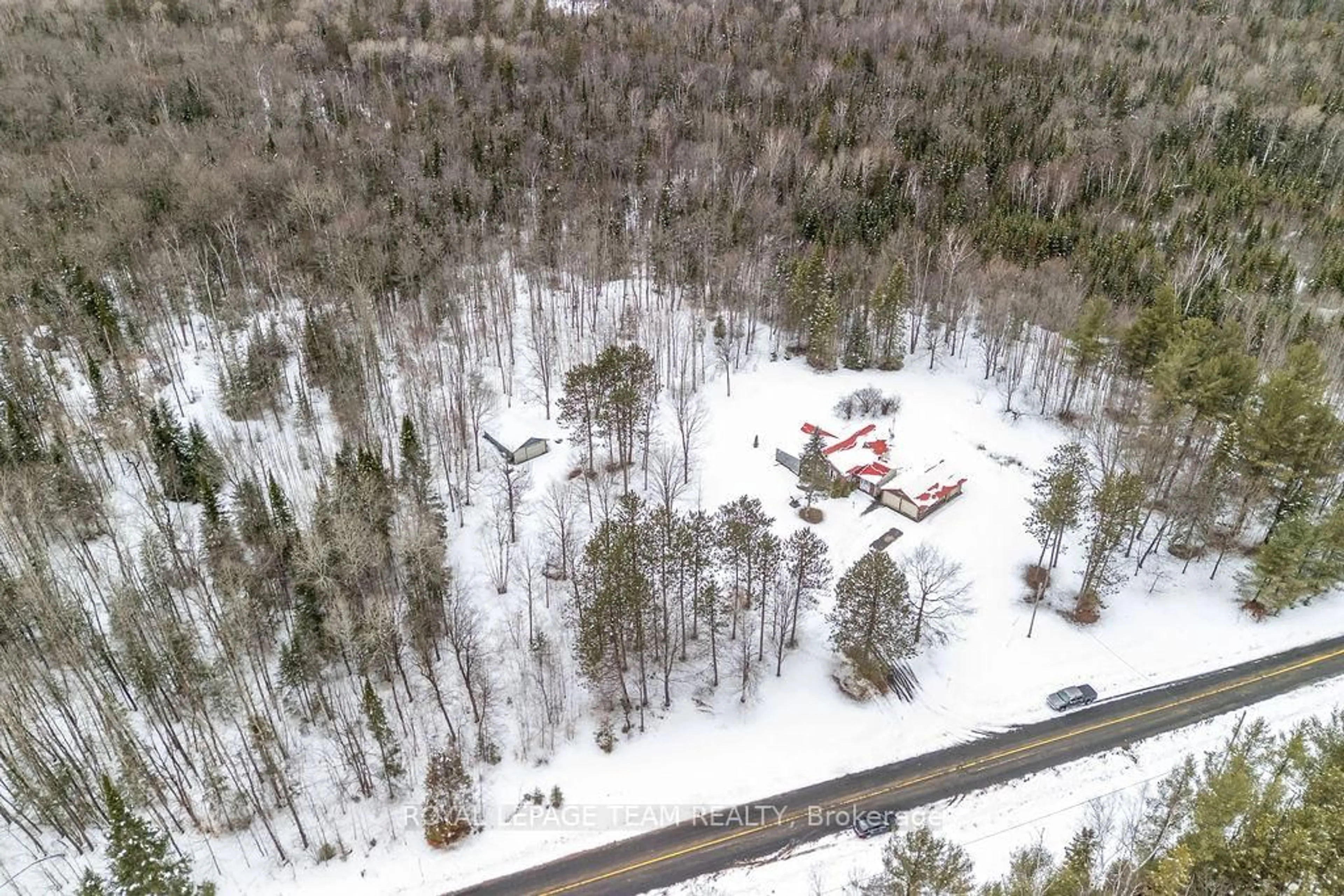 A pic from outside/outdoor area/front of a property/back of a property/a pic from drone, forest/trees view for 4379 Highway No. 523 Highway, South Algonquin Ontario K0J 2C0