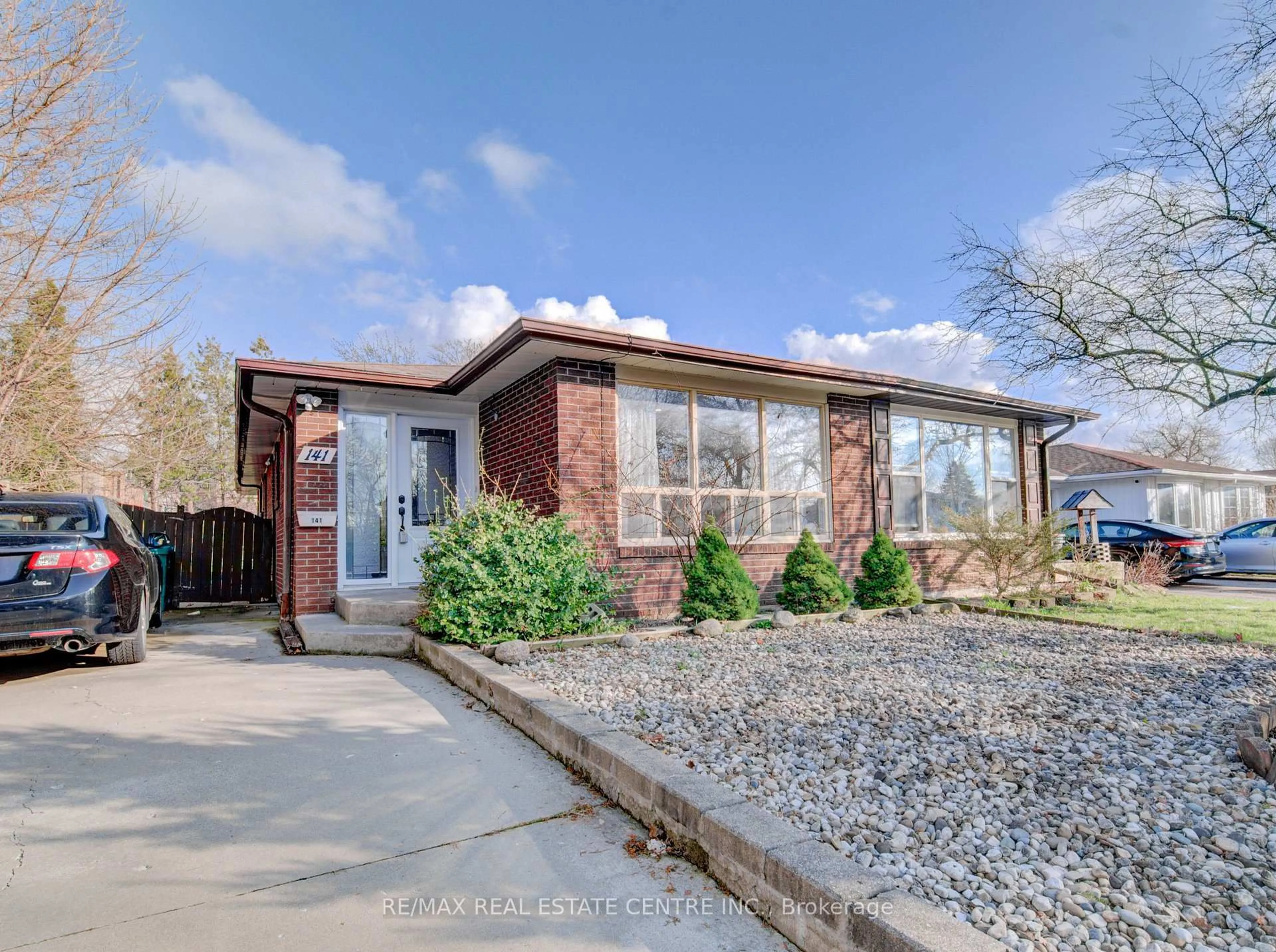 Home with brick exterior material, street for 141 Mooregate Cres, Kitchener Ontario N2M 2E9