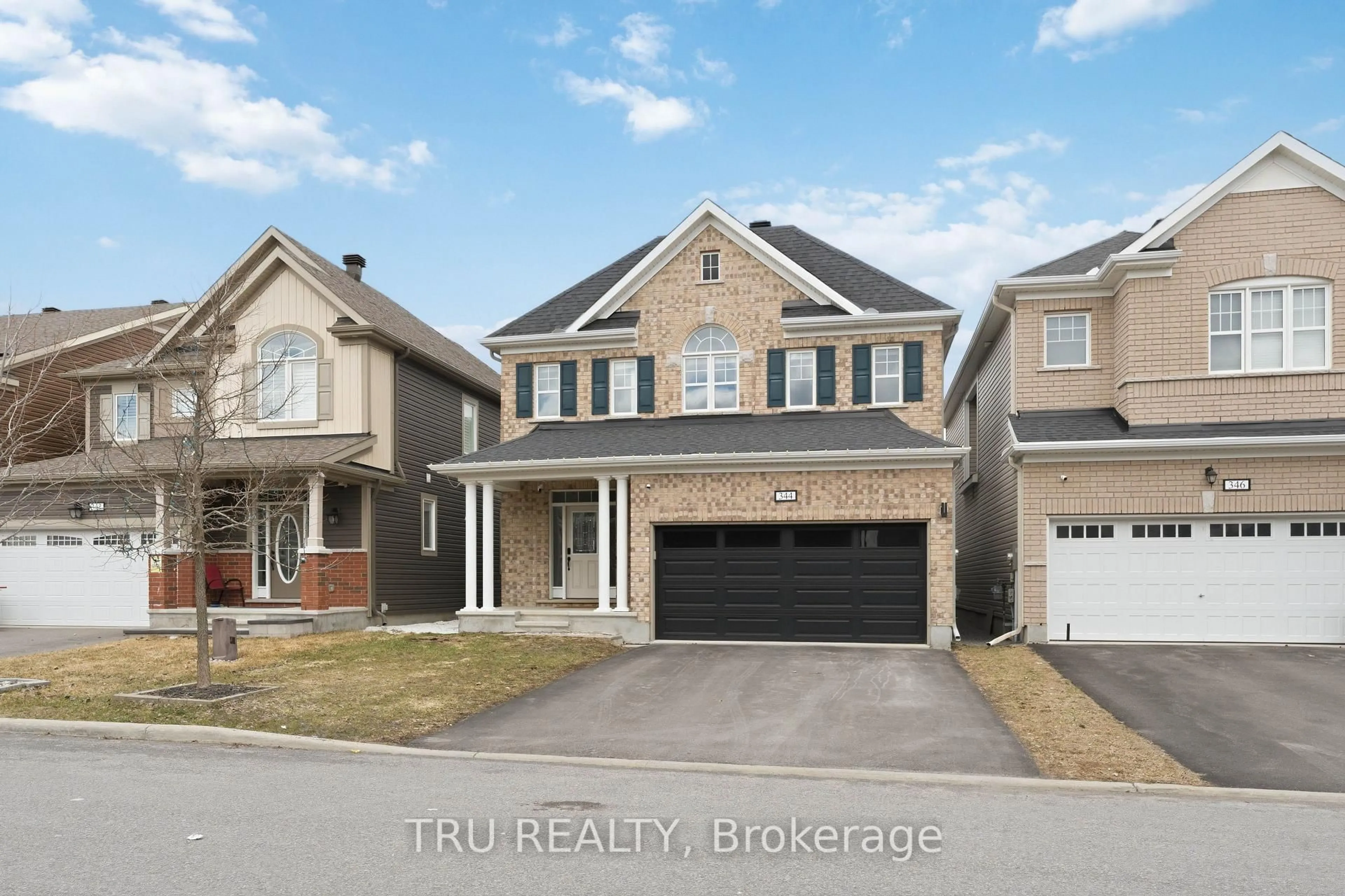Home with brick exterior material, street for 344 Sweetclover Way, Ottawa Ontario K4A 1E6