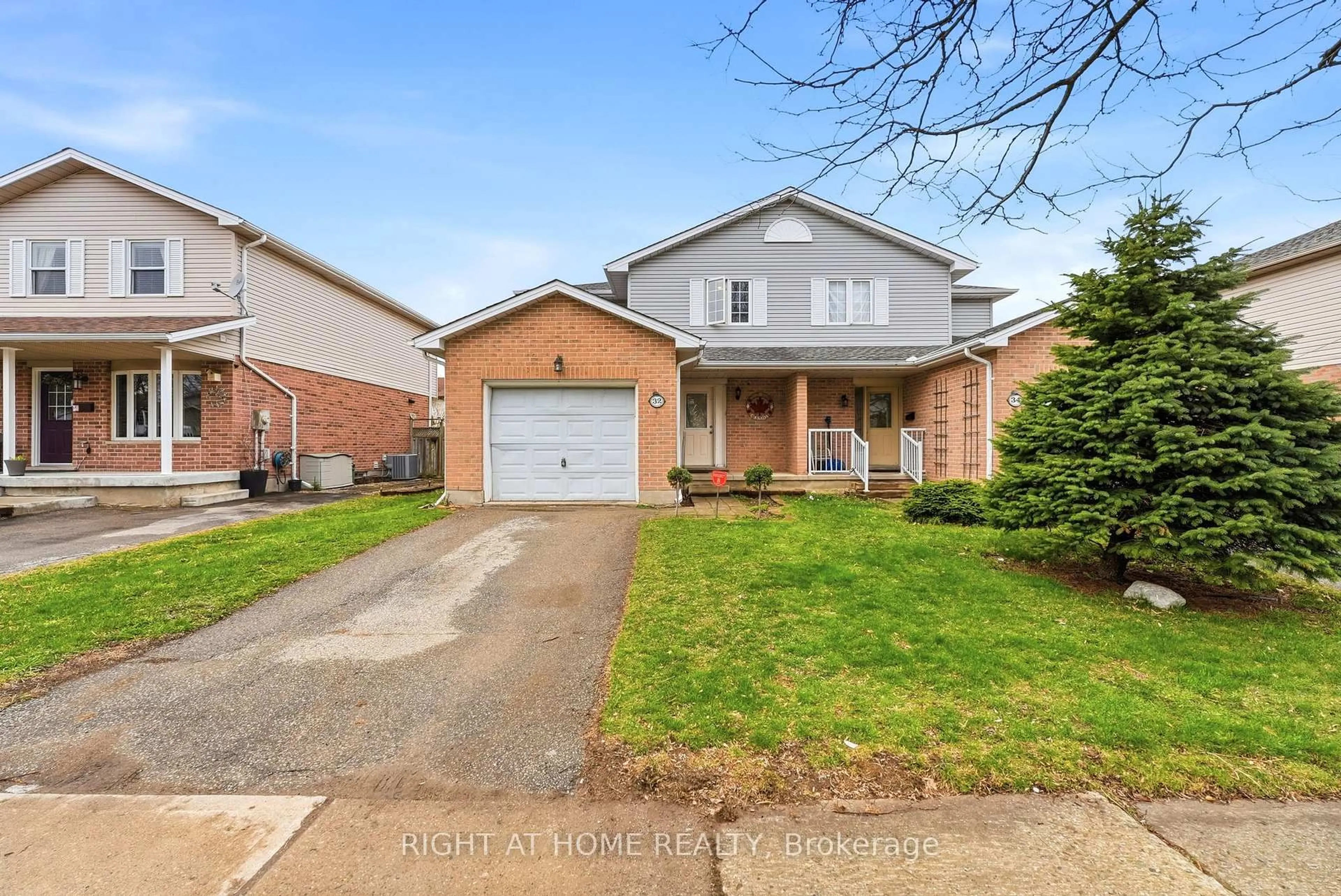 Home with brick exterior material, street for 32 Bowcott Cres, London East Ontario N5V 4W8