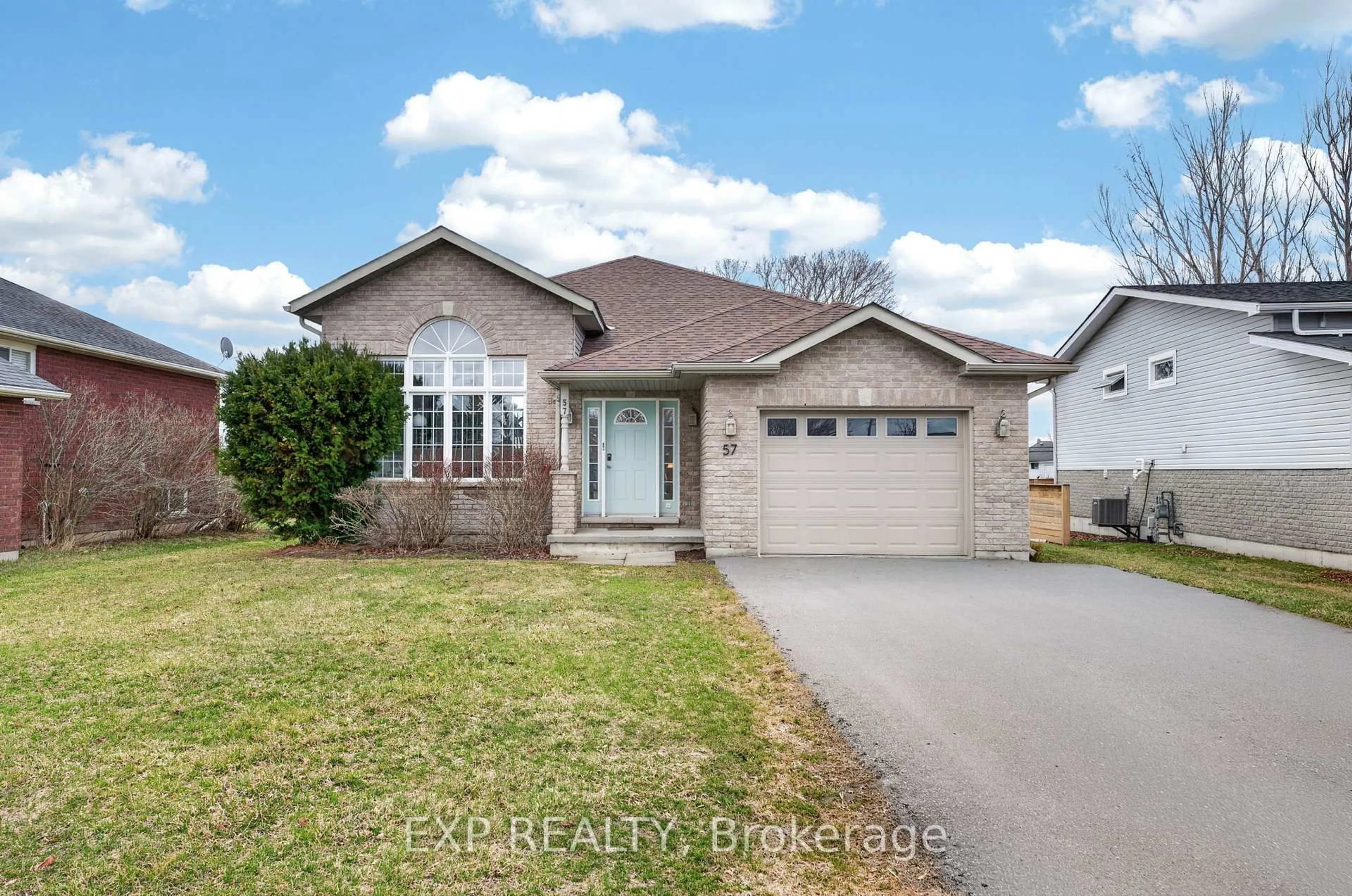 Home with brick exterior material, street for 57 Lake Breeze Crt, Prince Edward County Ontario K0K 3L0