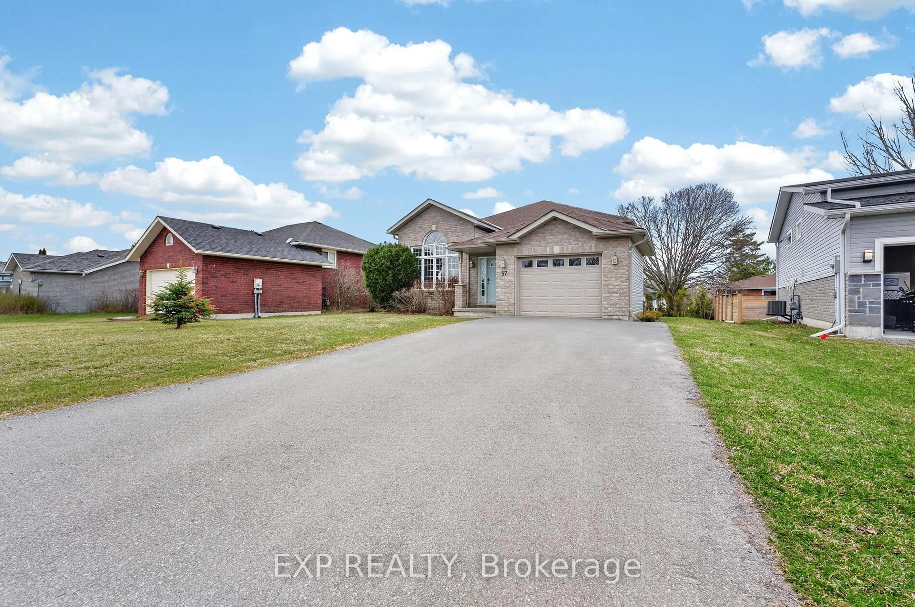 A pic from outside/outdoor area/front of a property/back of a property/a pic from drone, water/lake/river/ocean view for 57 Lake Breeze Crt, Prince Edward County Ontario K0K 3L0