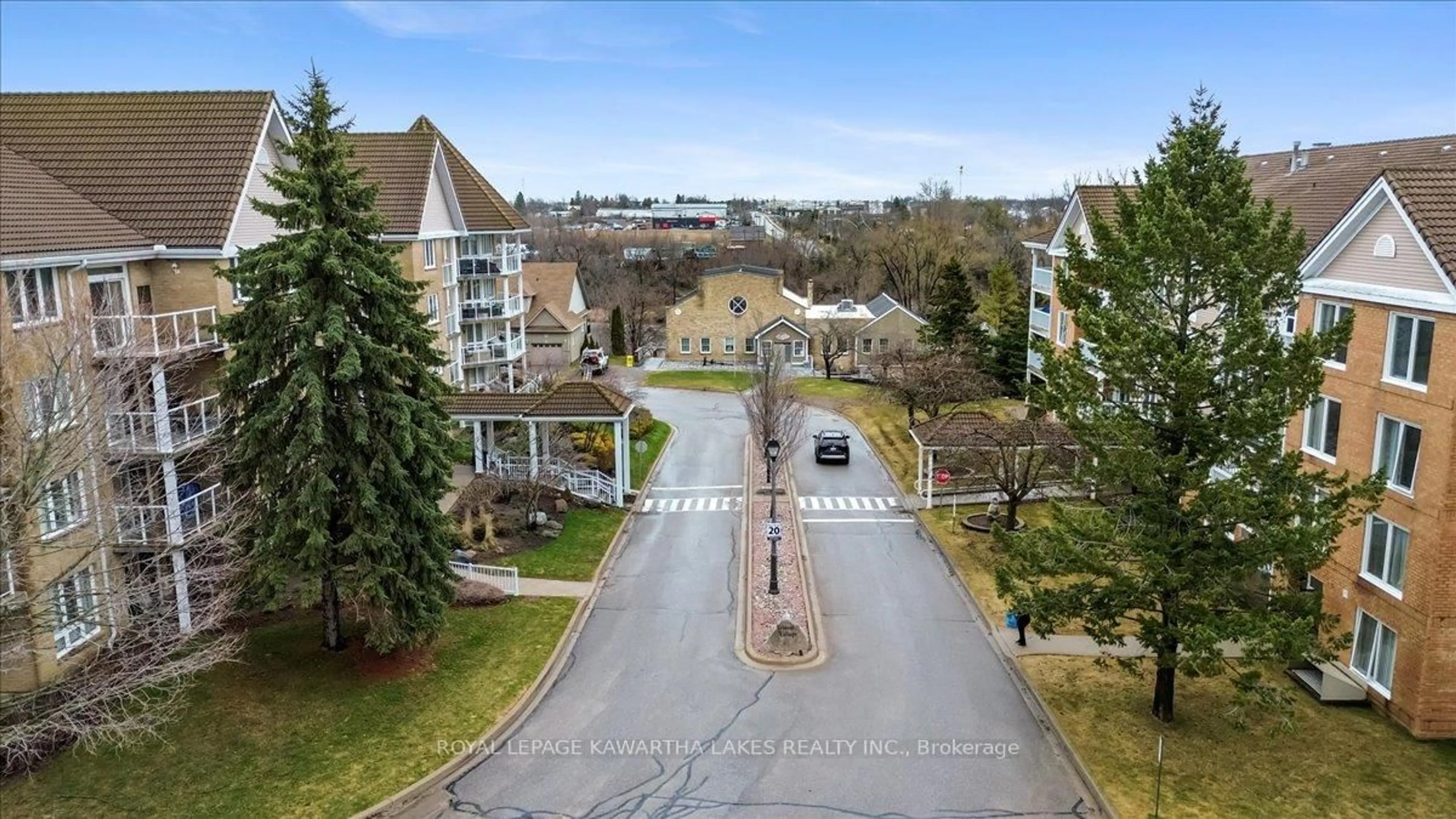 A pic from outside/outdoor area/front of a property/back of a property/a pic from drone, unknown for 51 Rivermill Blvd #404, Kawartha Lakes Ontario K9V 6E8