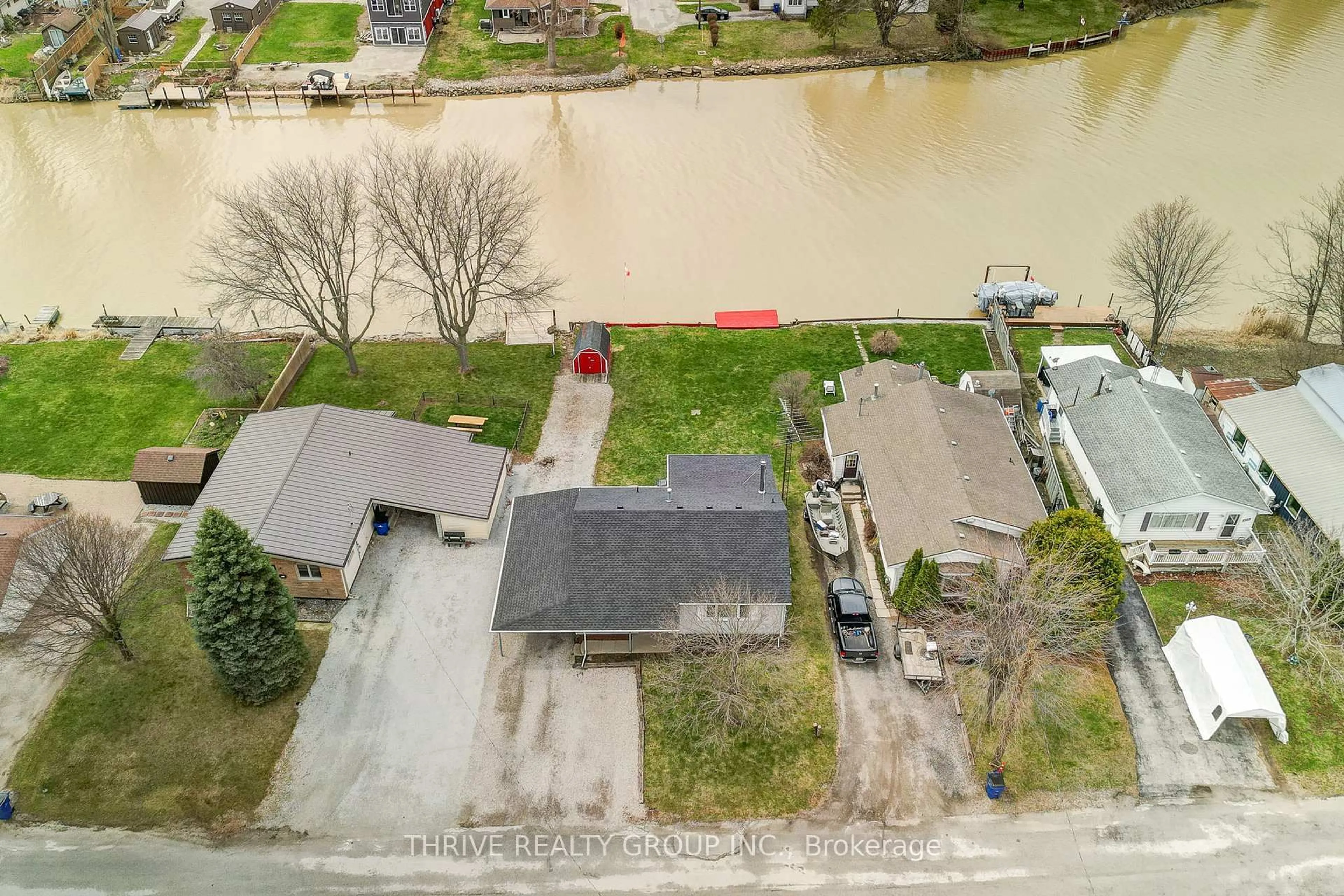 A pic from outside/outdoor area/front of a property/back of a property/a pic from drone, water/lake/river/ocean view for 131 Water St, Chatham-Kent Ontario N8A 2E8