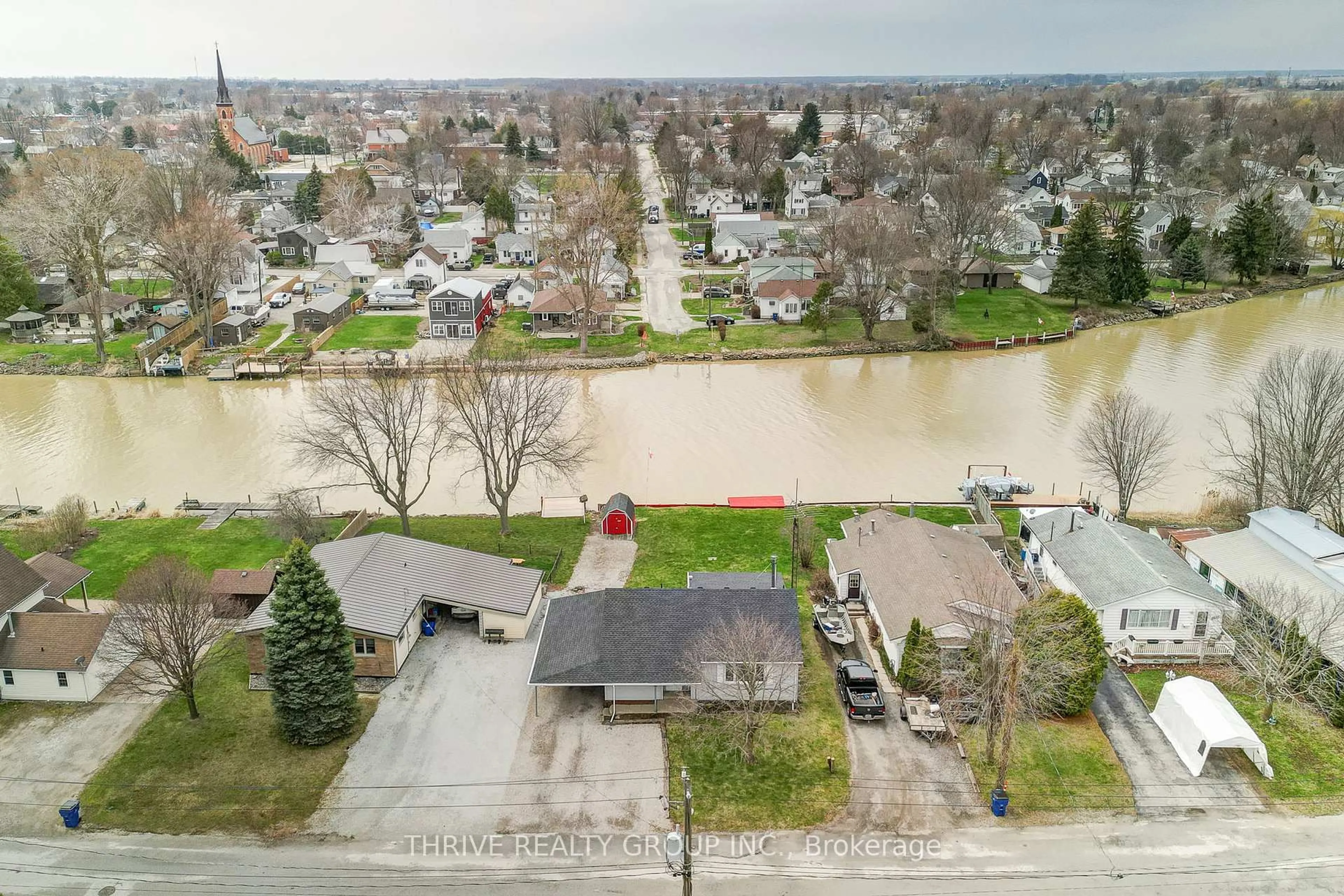 A pic from outside/outdoor area/front of a property/back of a property/a pic from drone, water/lake/river/ocean view for 131 Water St, Chatham-Kent Ontario N8A 2E8