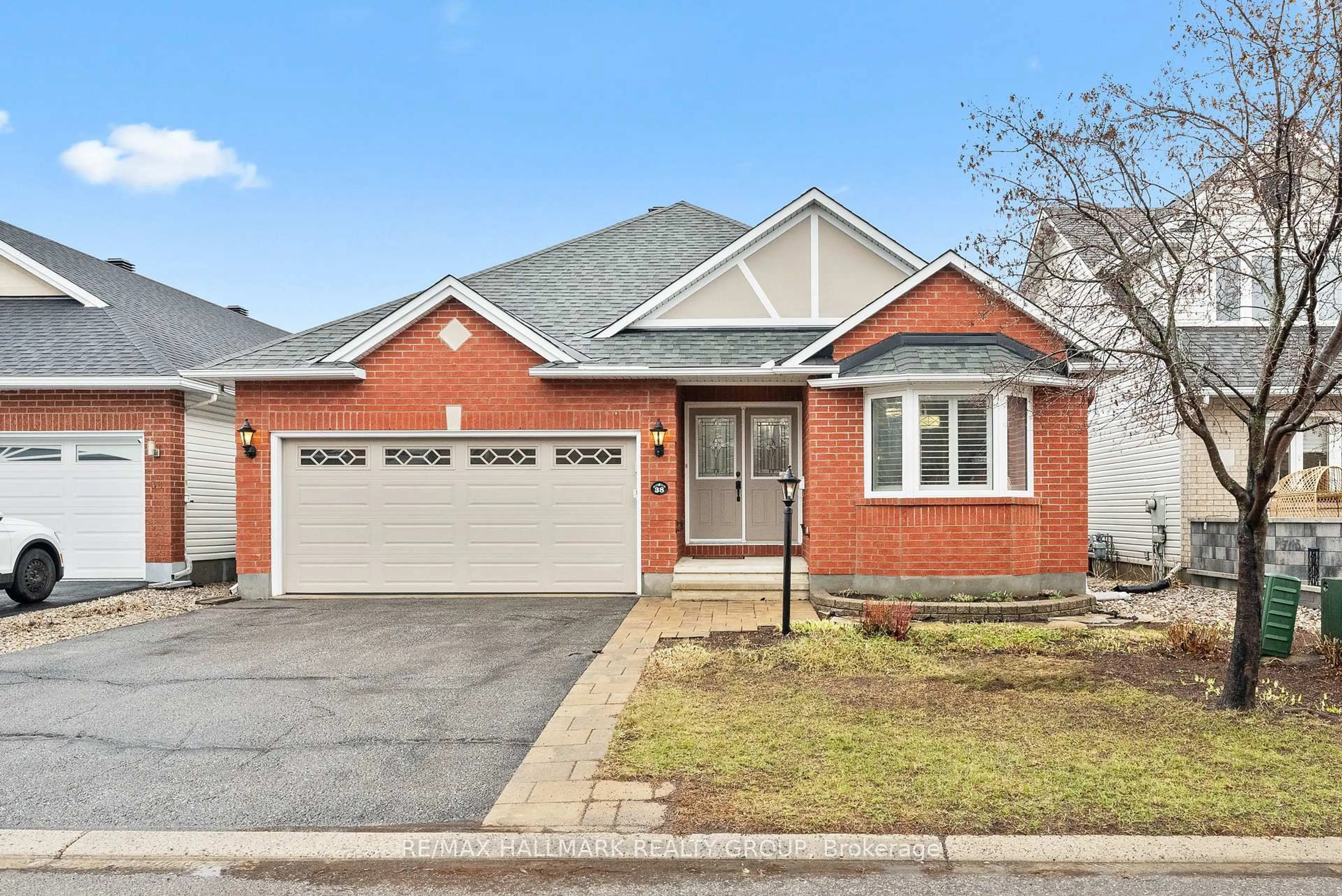 Home with brick exterior material, street for 38 North Harrow Dr, Ottawa Ontario K2J 4V7