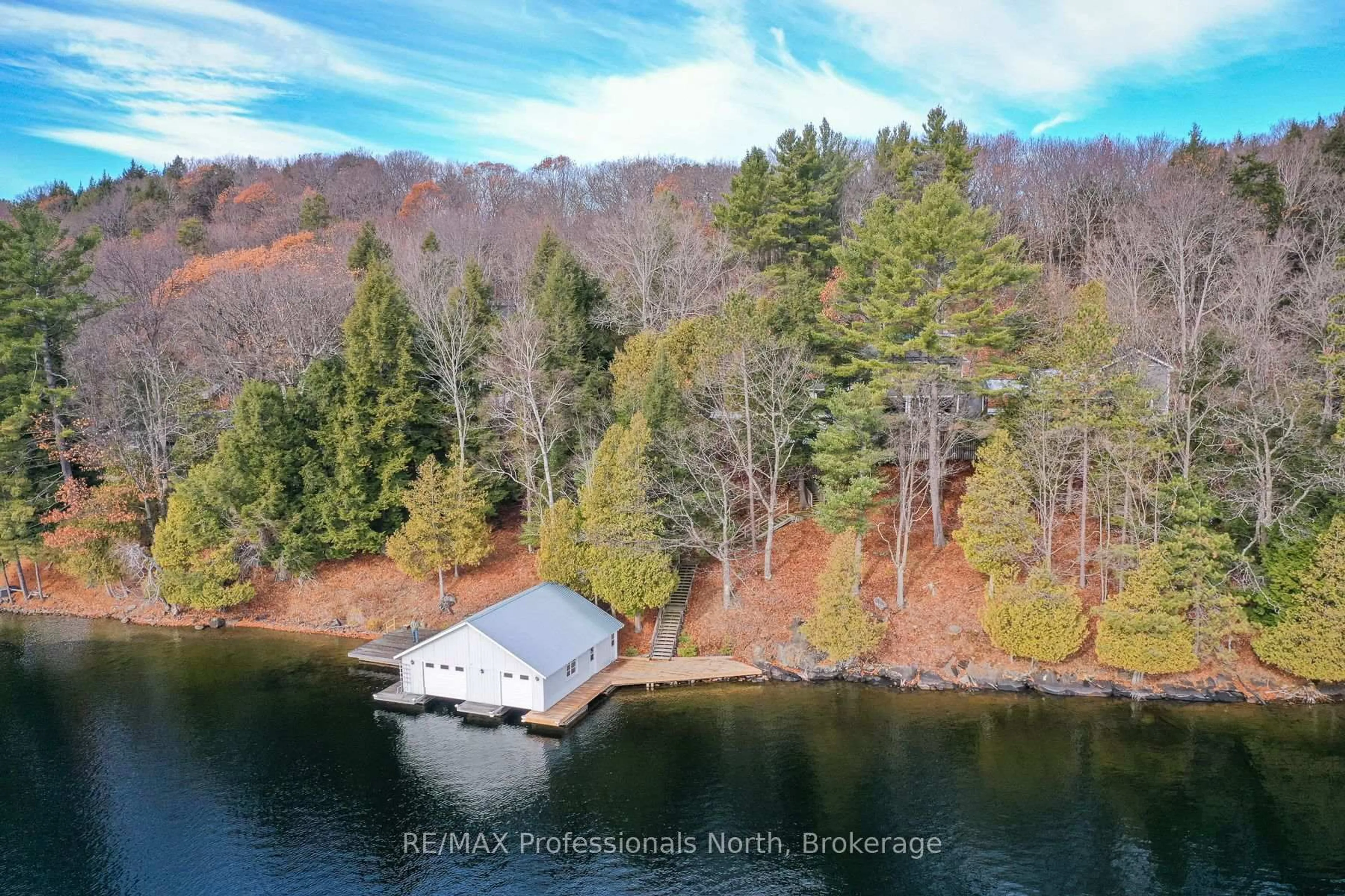 A pic from outside/outdoor area/front of a property/back of a property/a pic from drone, water/lake/river/ocean view for 1009-2 Arts Rd, Lake of Bays Ontario P0A 1H0