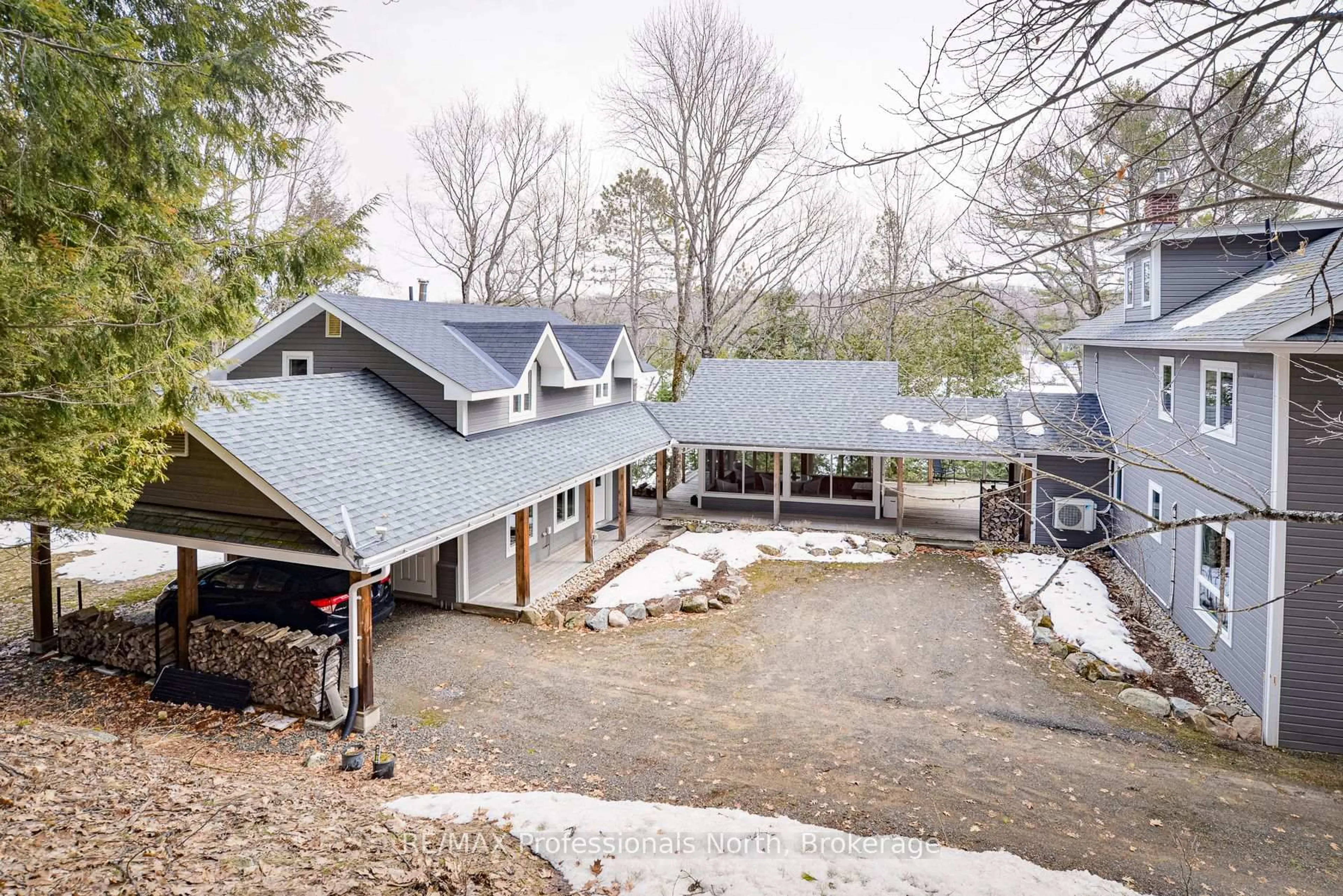 A pic from outside/outdoor area/front of a property/back of a property/a pic from drone, mountain view for 1009-2 Arts Rd, Lake of Bays Ontario P0A 1H0