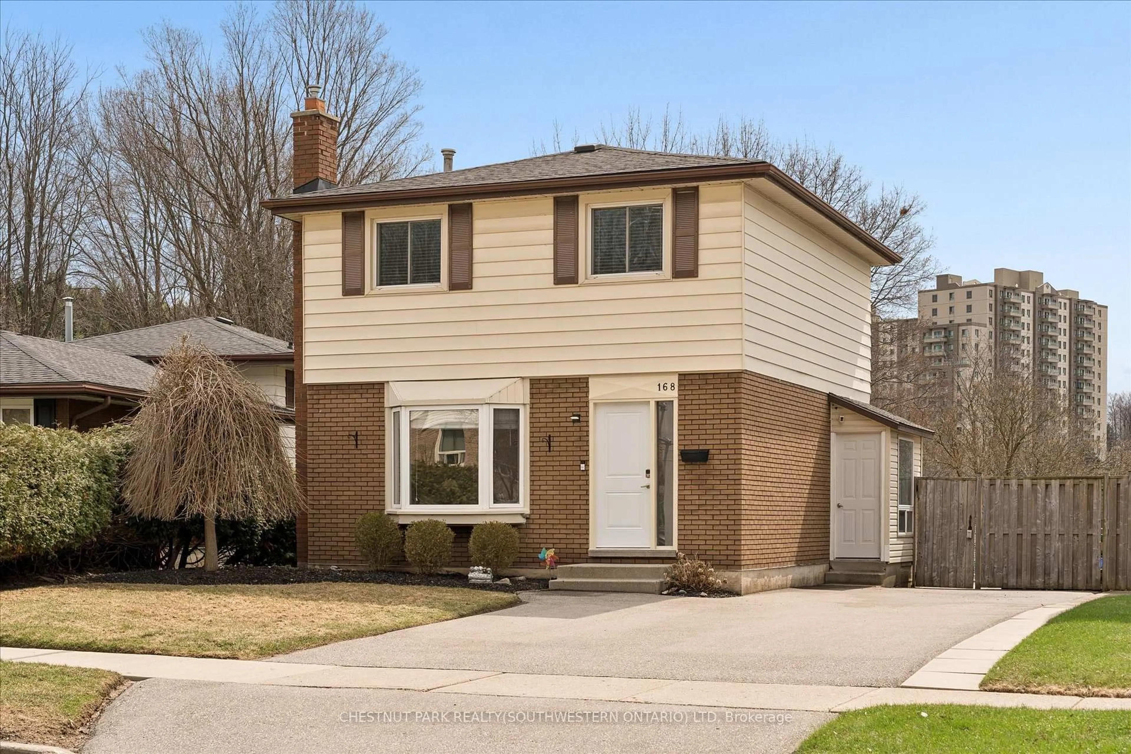 Home with brick exterior material, street for 168 Green Valley Dr, Kitchener Ontario N2P 1C4