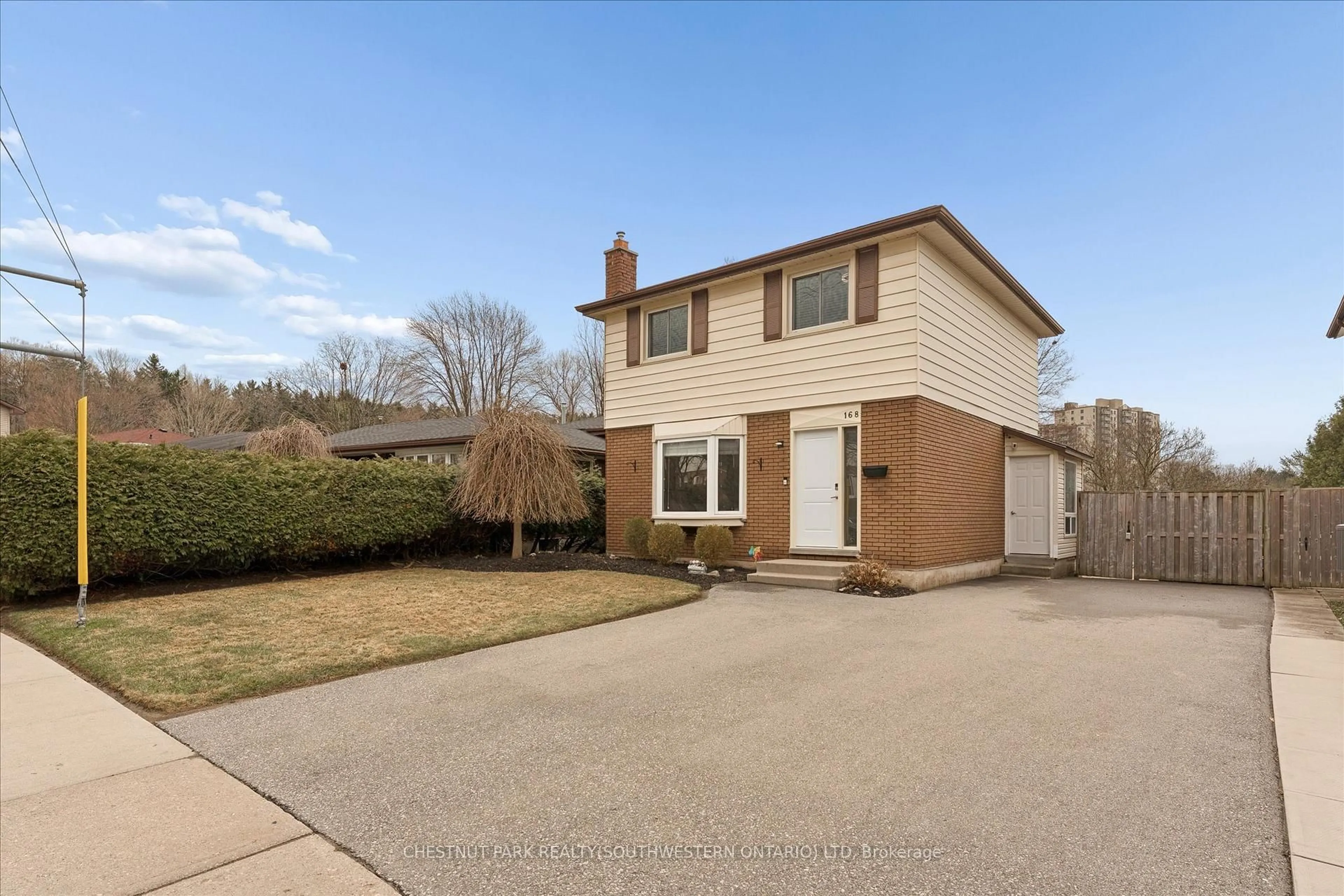 Home with brick exterior material, street for 168 Green Valley Dr, Kitchener Ontario N2P 1C4
