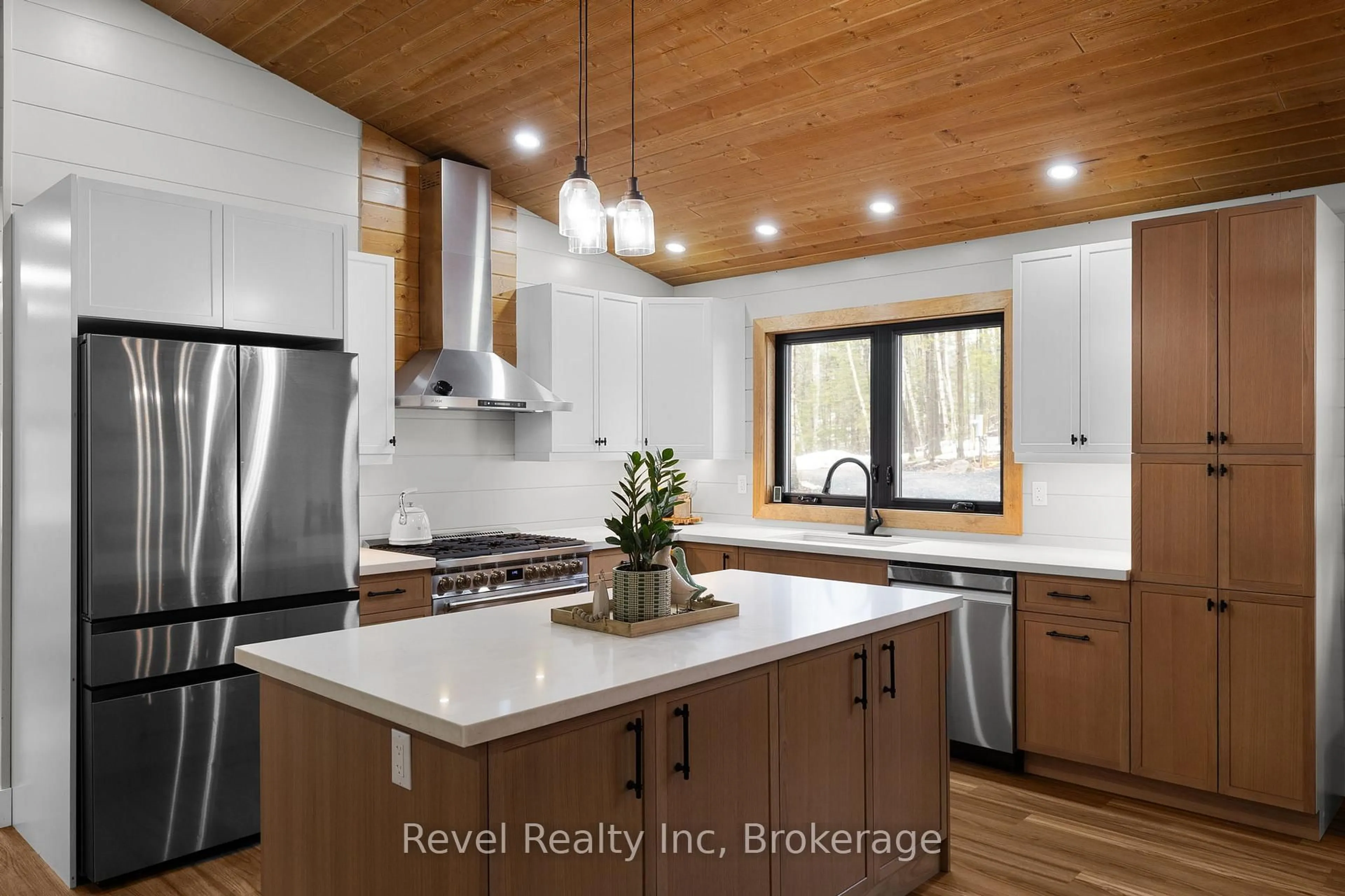 Open concept kitchen, wood/laminate floor for 84 Woods Rd, Carling Ontario P0G 1G0