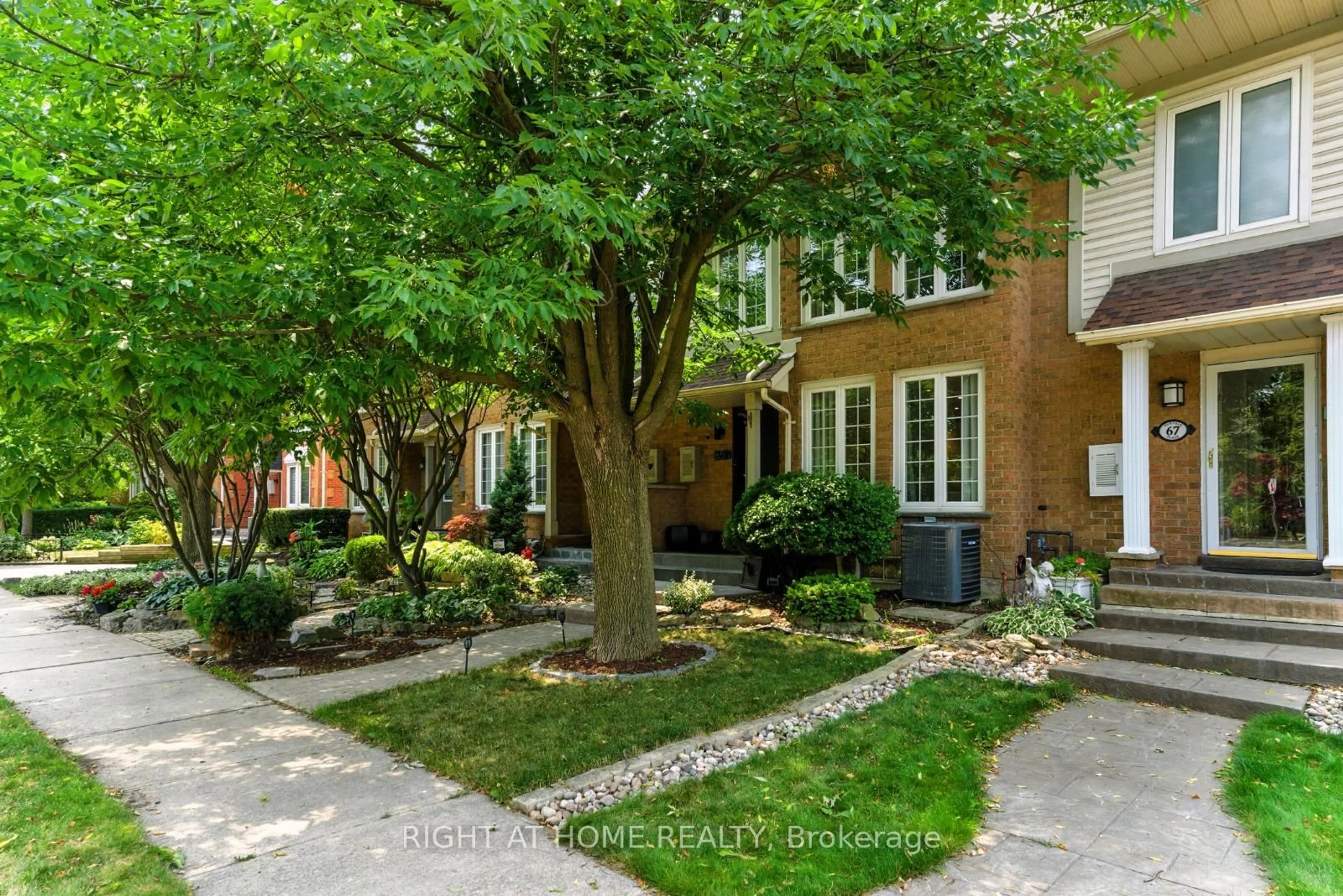 Home with brick exterior material, street for 65 Sunvale Pl, Hamilton Ontario L8E 4Z6