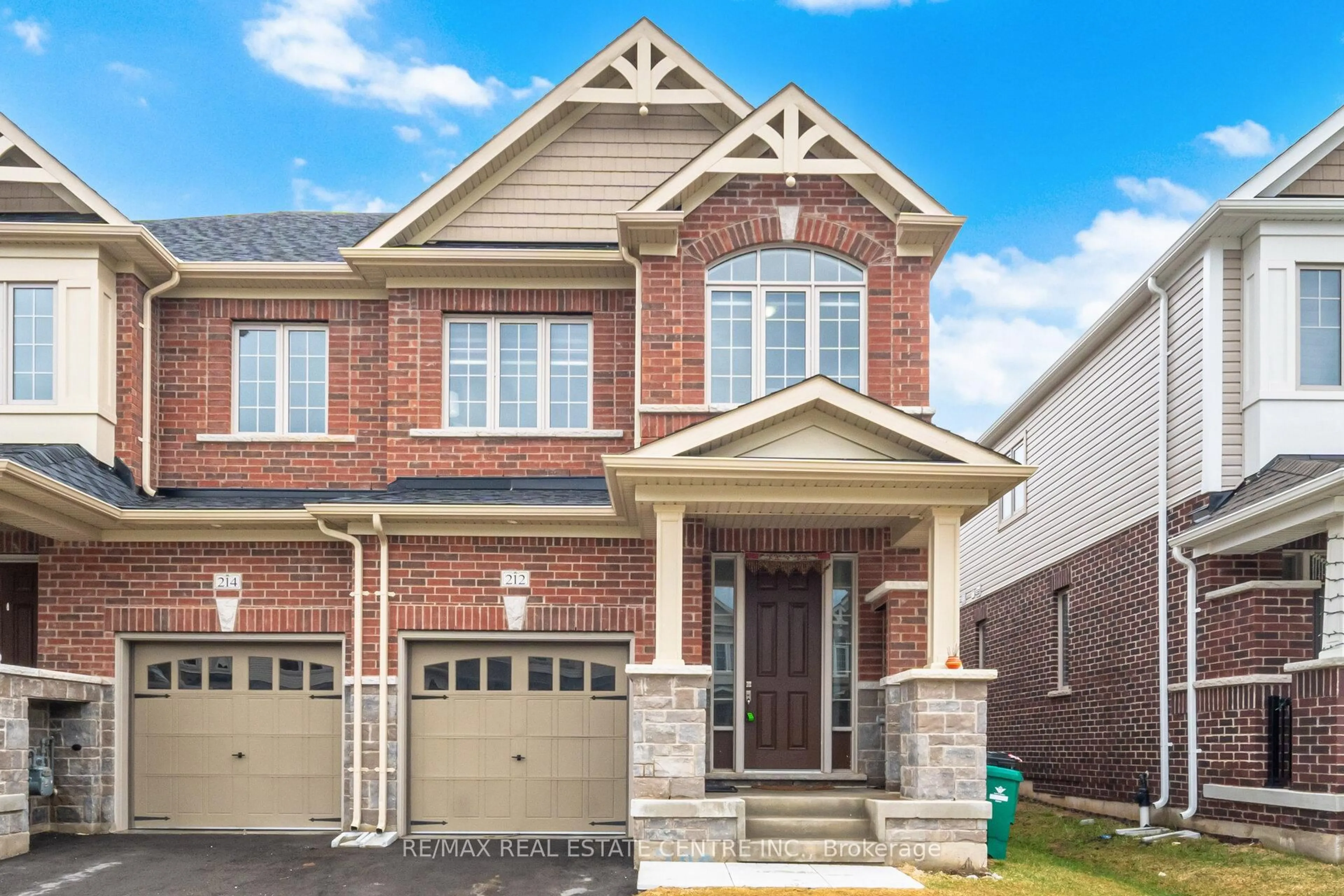 Home with brick exterior material, street for 212 Broadacre Dr, Kitchener Ontario N2R 0S6