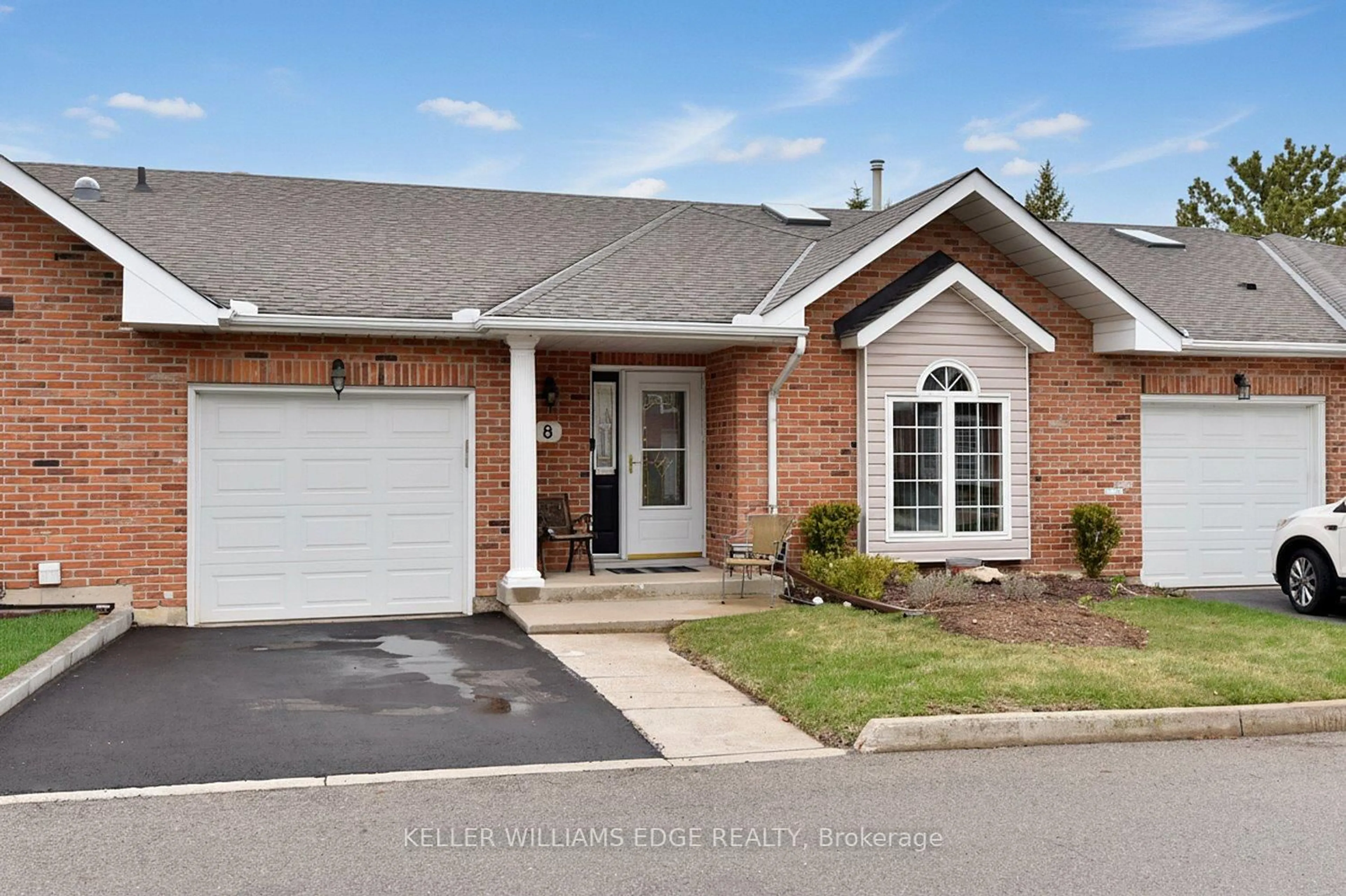 Home with brick exterior material, street for 20 Meadowlands Blvd #8, Hamilton Ontario L9K 1J5