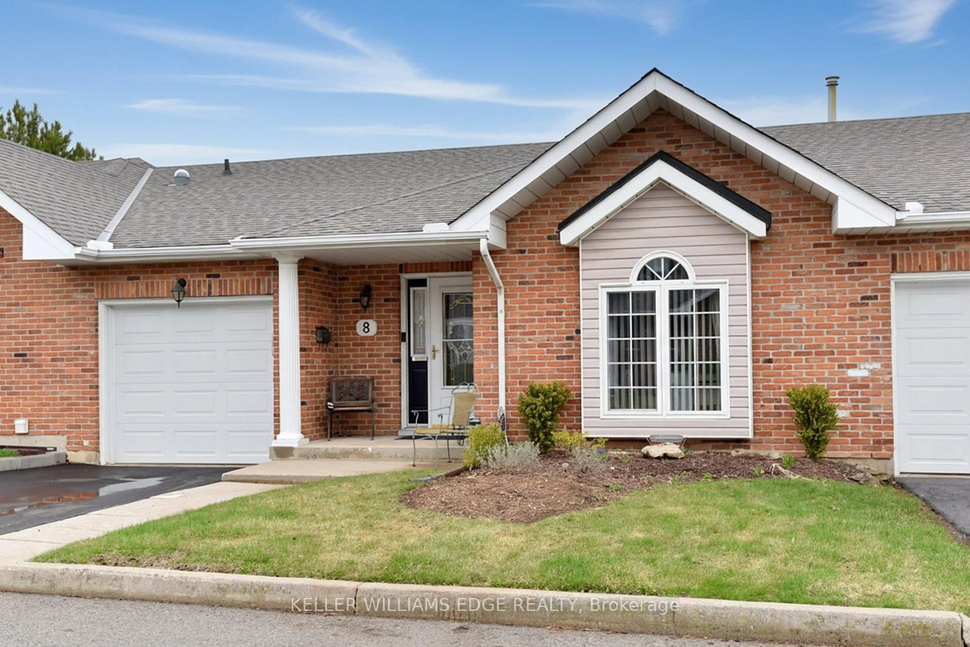 Home with brick exterior material, street for 20 Meadowlands Blvd #8, Hamilton Ontario L9K 1J5